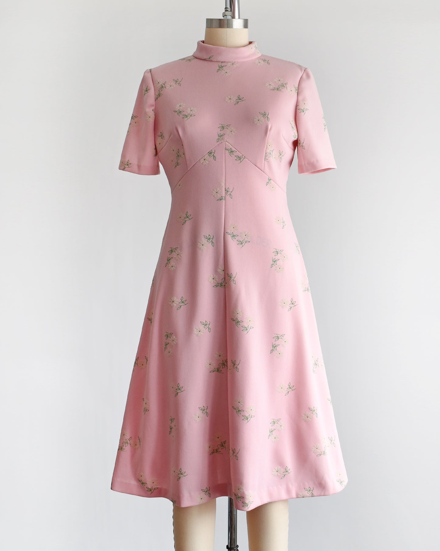 a vintage 1960s pink and white floral mod dress.