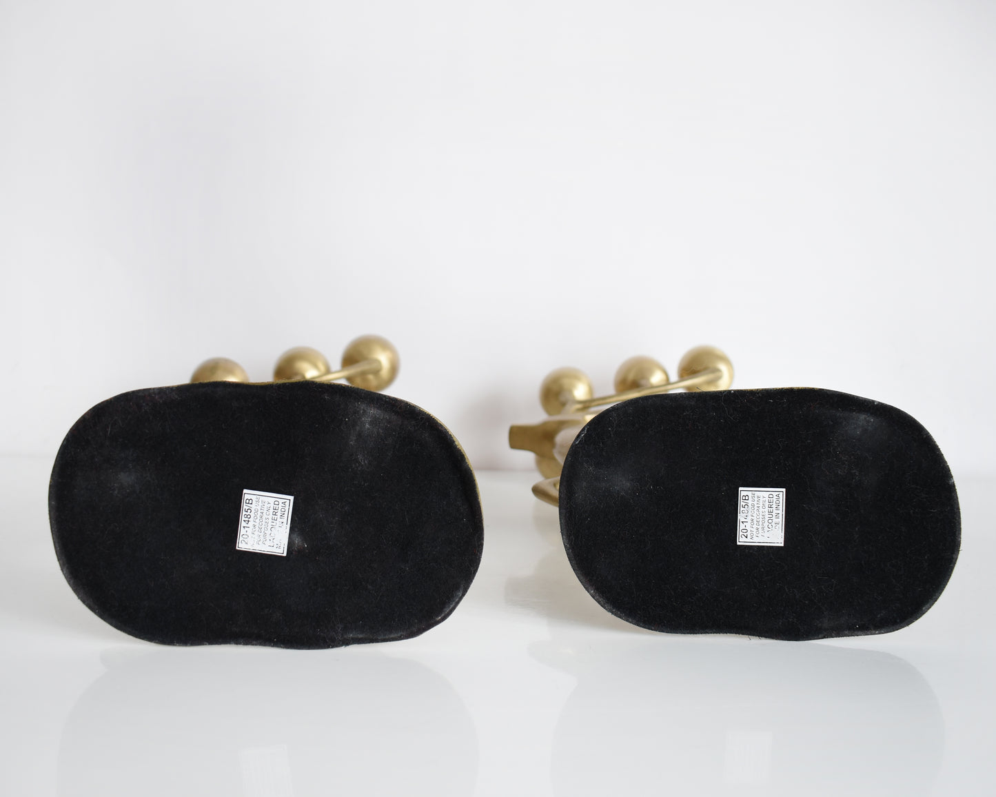 The black felt bottoms on the base.