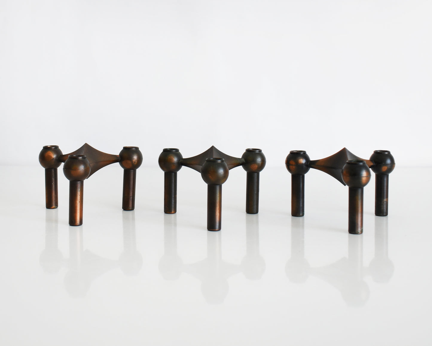 a set of three vintage late 1960s early 1970s modular candle holders