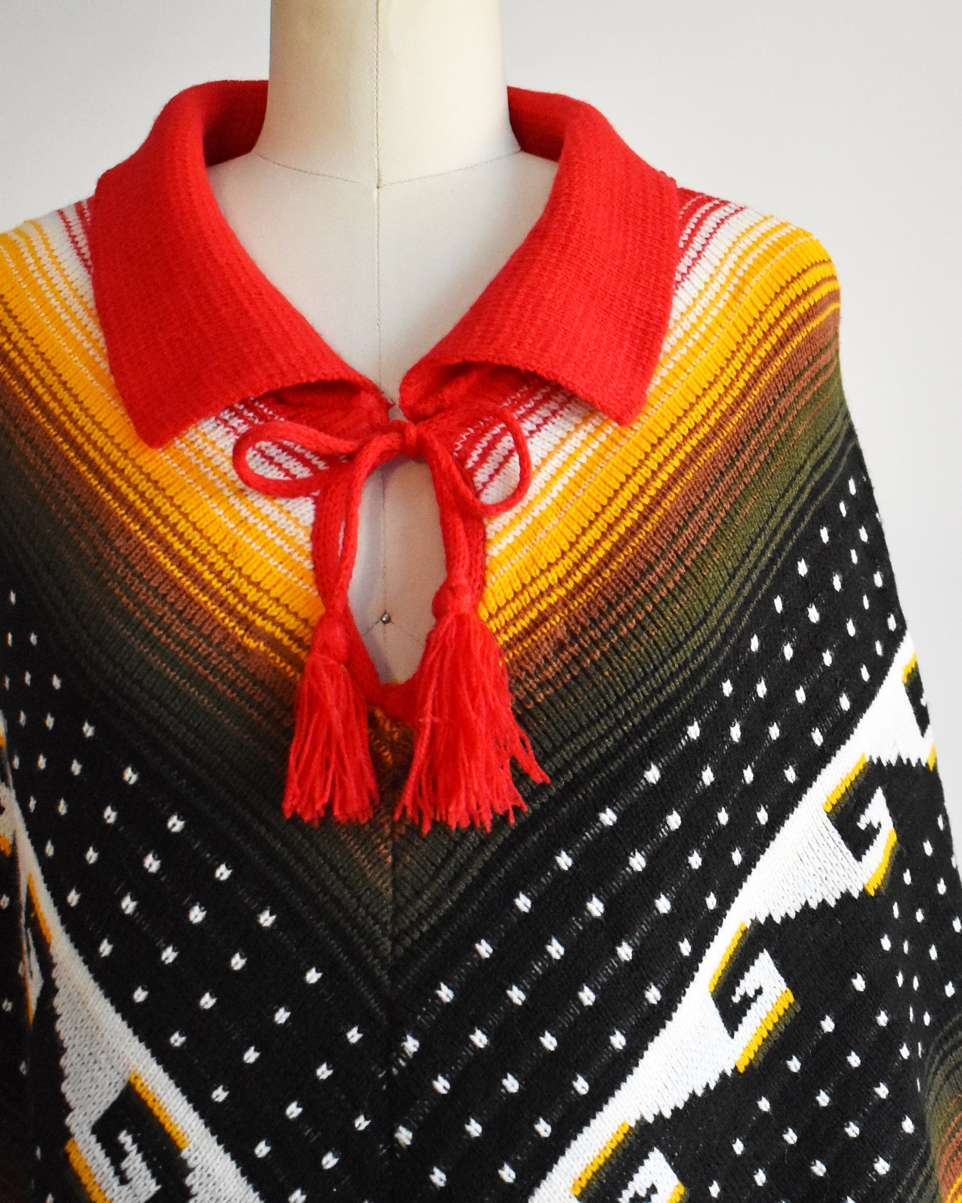 Close up of the folded over collar and tied bow