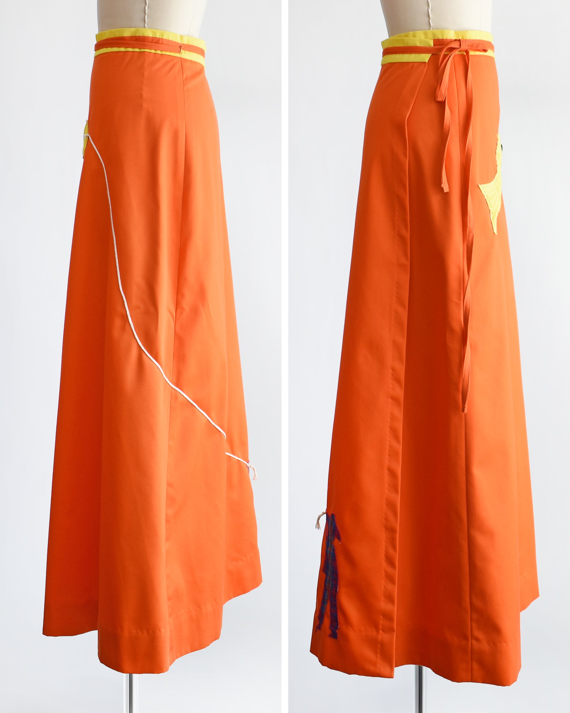 A vintage 1970s fish kite appliqué orange and yellow wrap skirt. The left photo shows the white kite line
