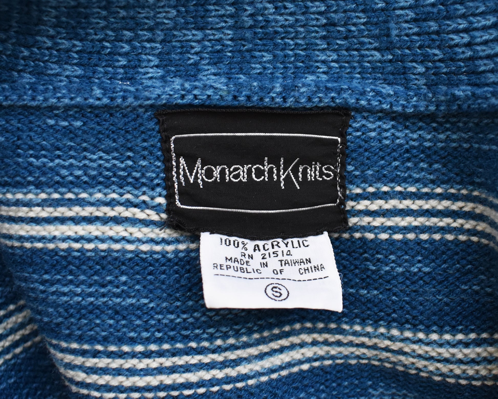 close up of the tag that says Monarch Knits