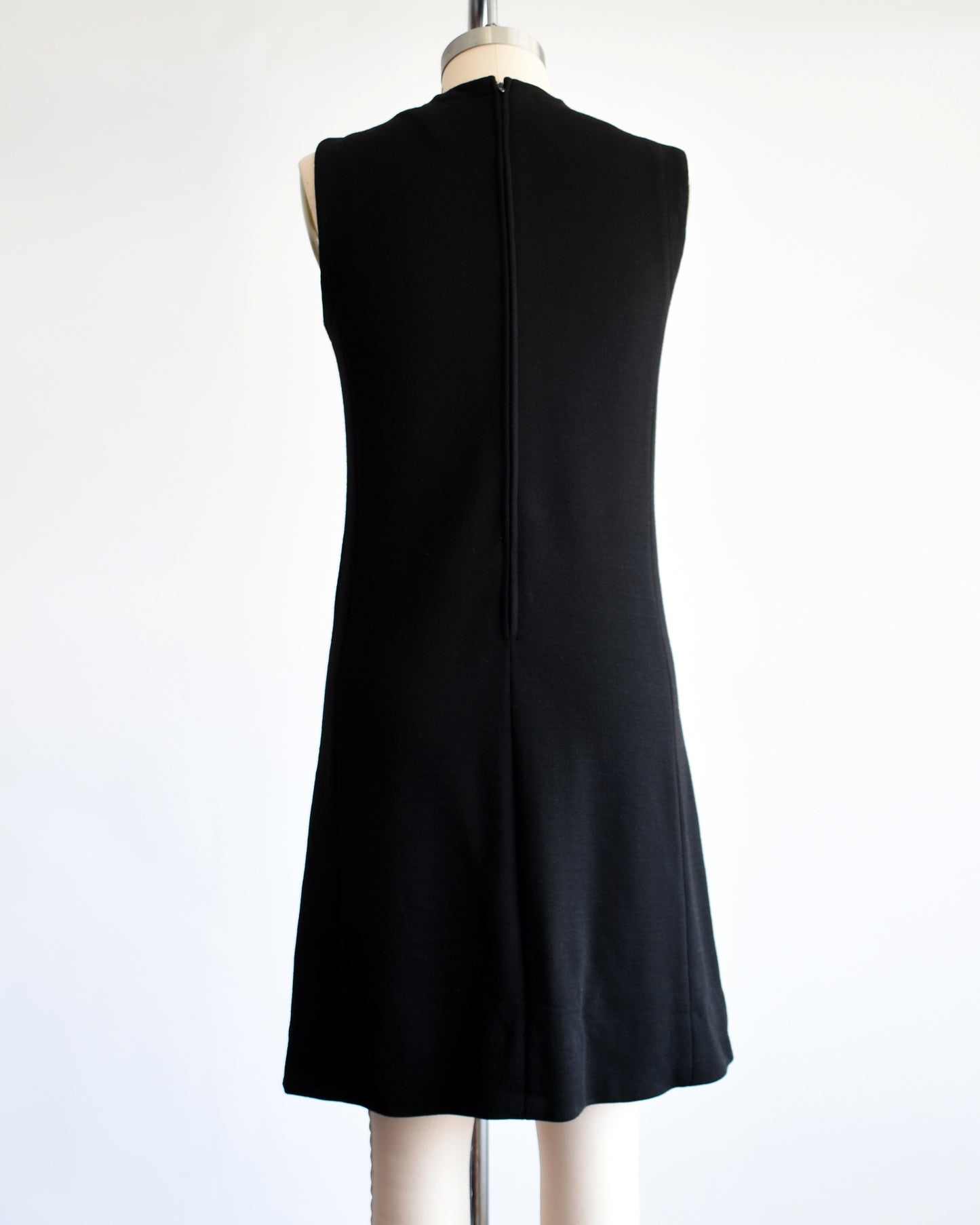 back view of  a vintage 1960s black keyhole rhinestone dress
