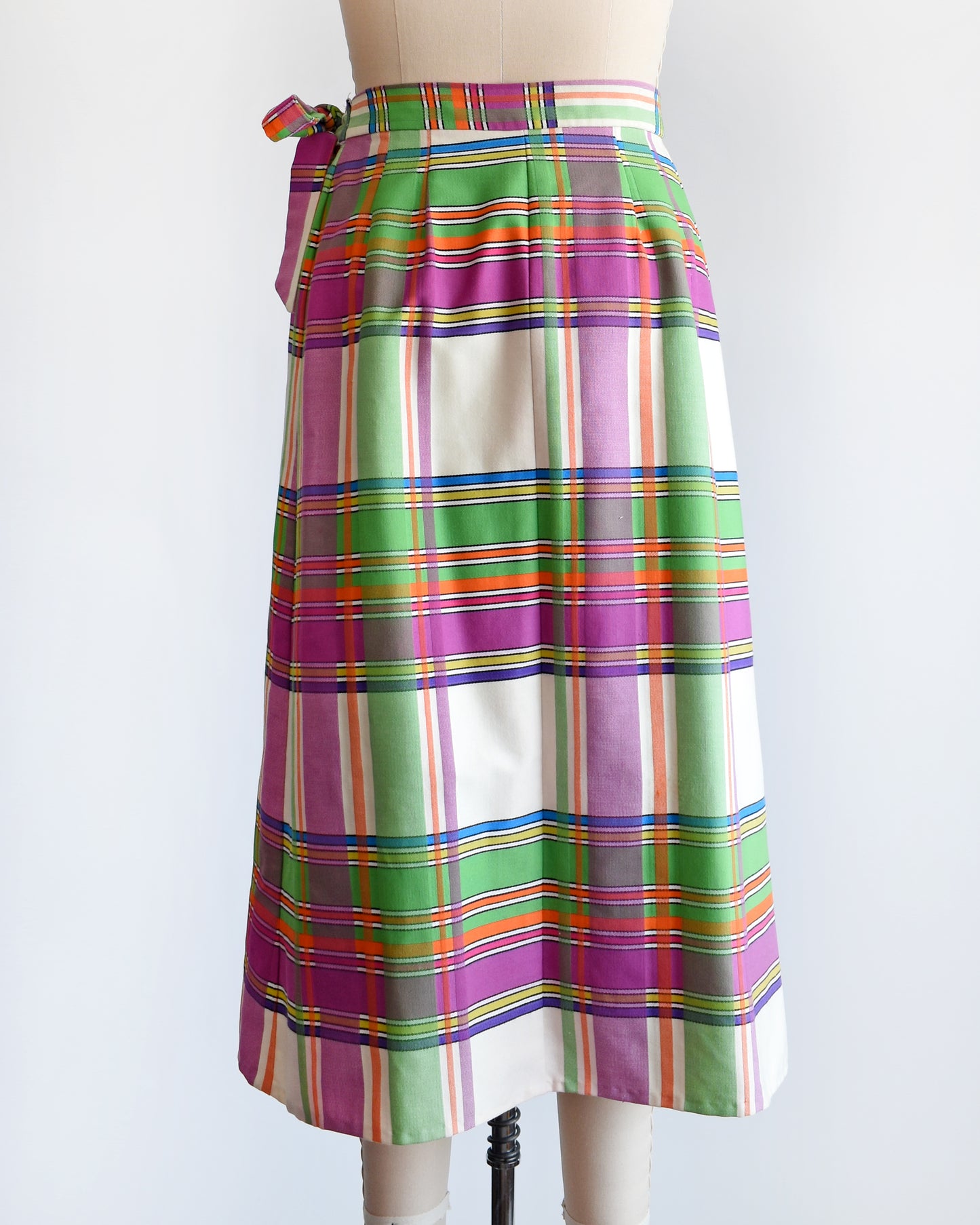 back view of a vintage 60s plaid wrap skirt