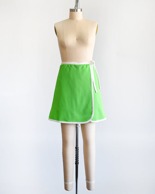 a vintage 1970s green and white skort with decorative tie
