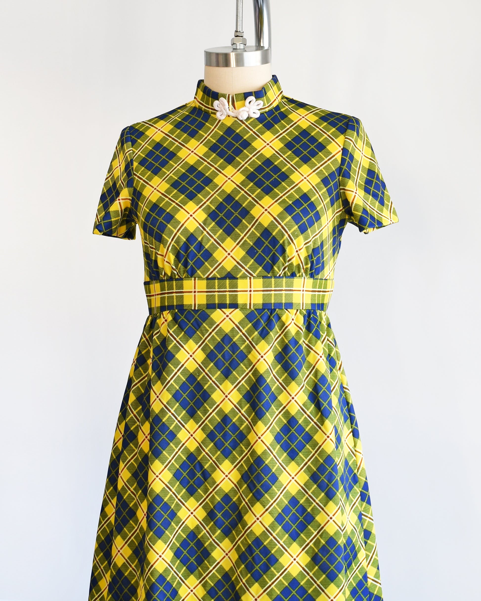 side front view of a yellow and blue plaid mod mini dress