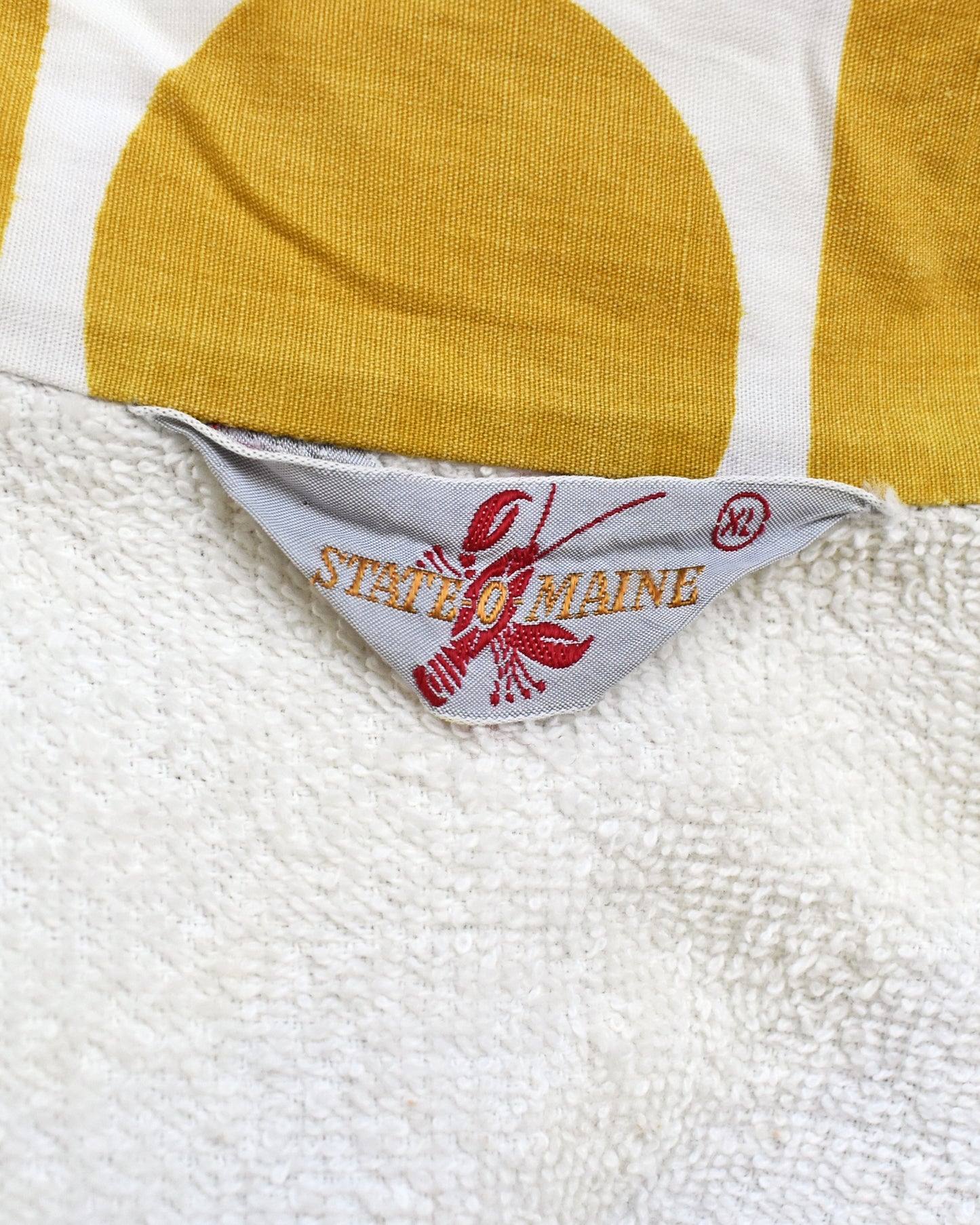 Close-up the 'State of Maine' label.