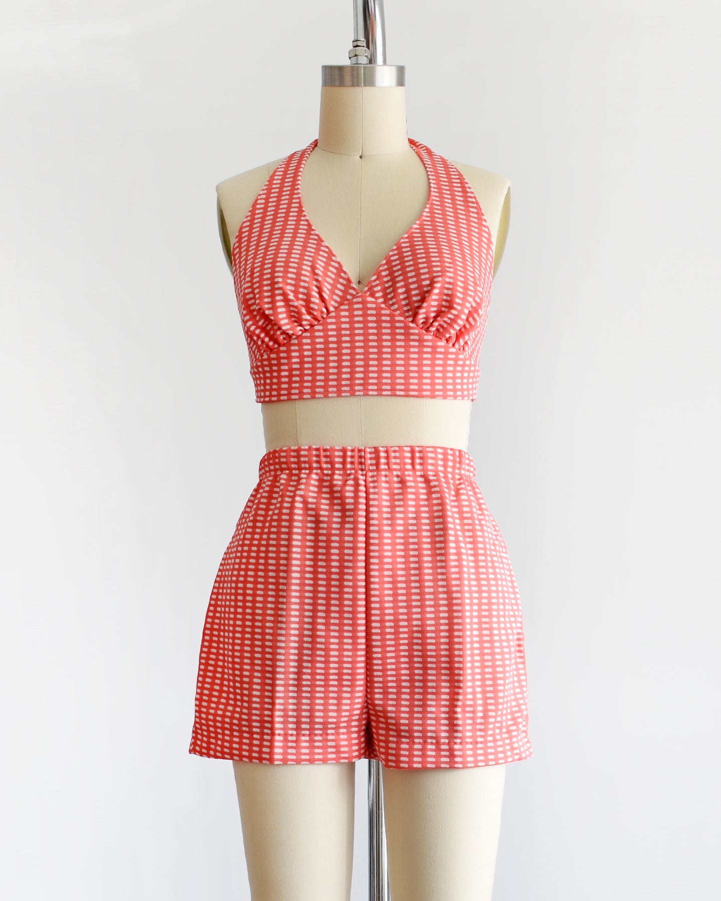 Super cute vintage 1970s coral pink two piece halter top and short set