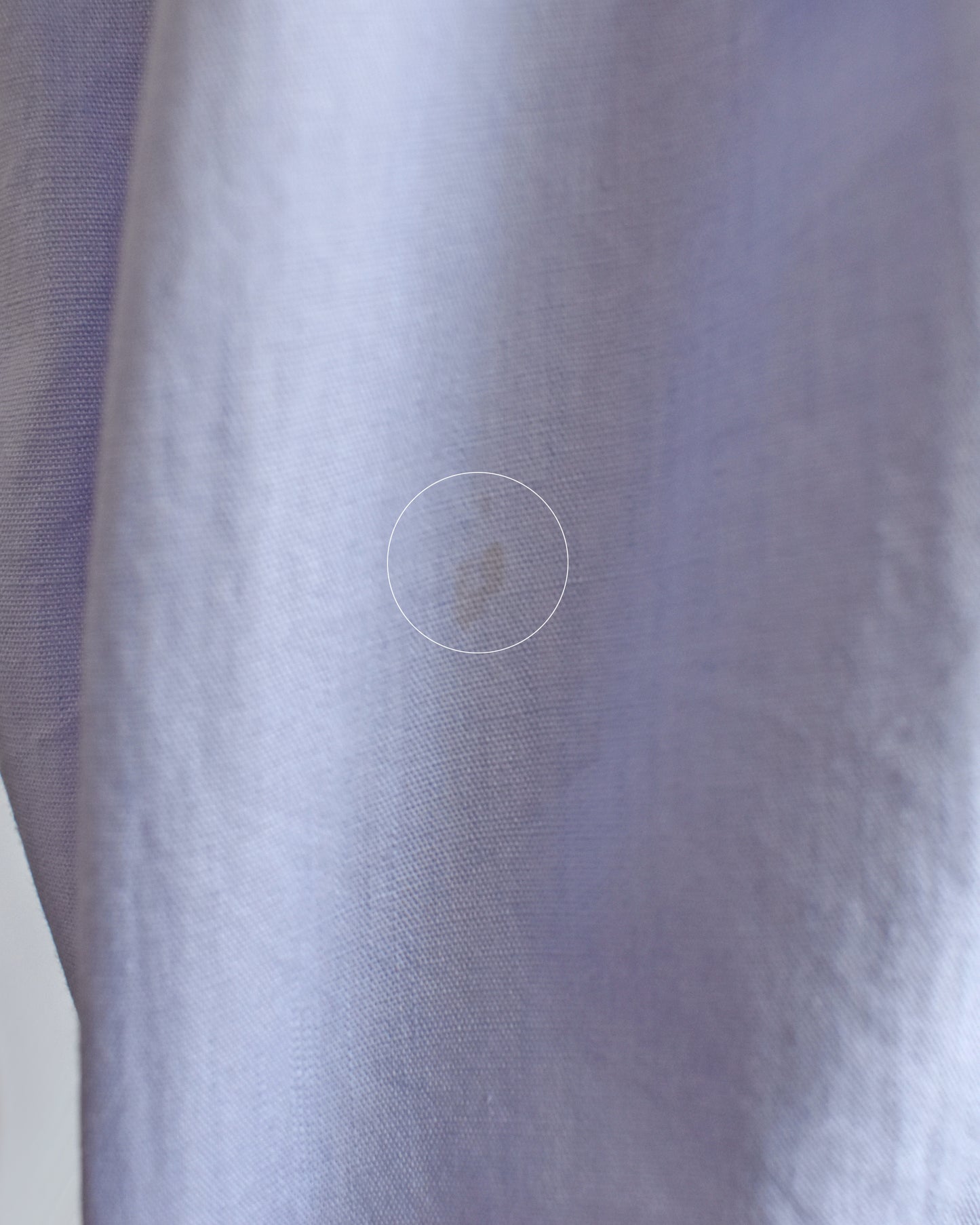 close up of a small mark on the back of the dress