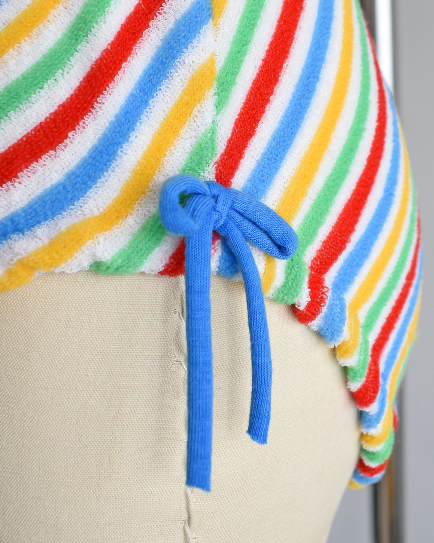 close up of the blue decorative bows on the hips