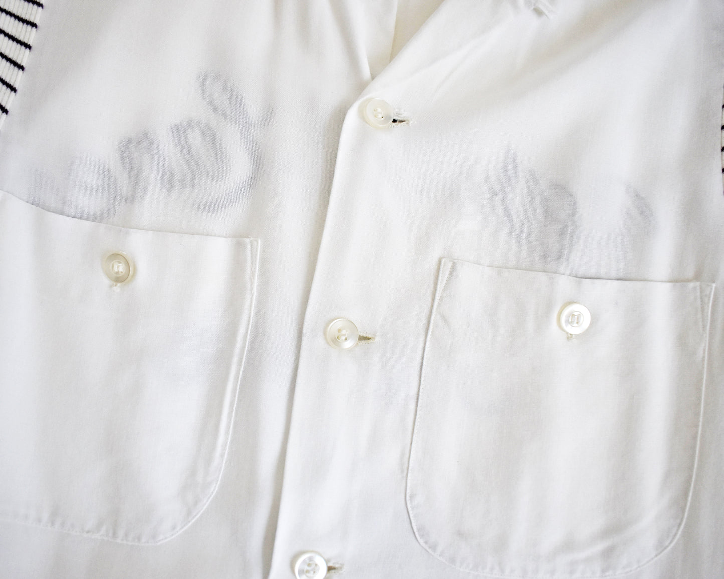 close up of the chest pockets on the front of the shirt