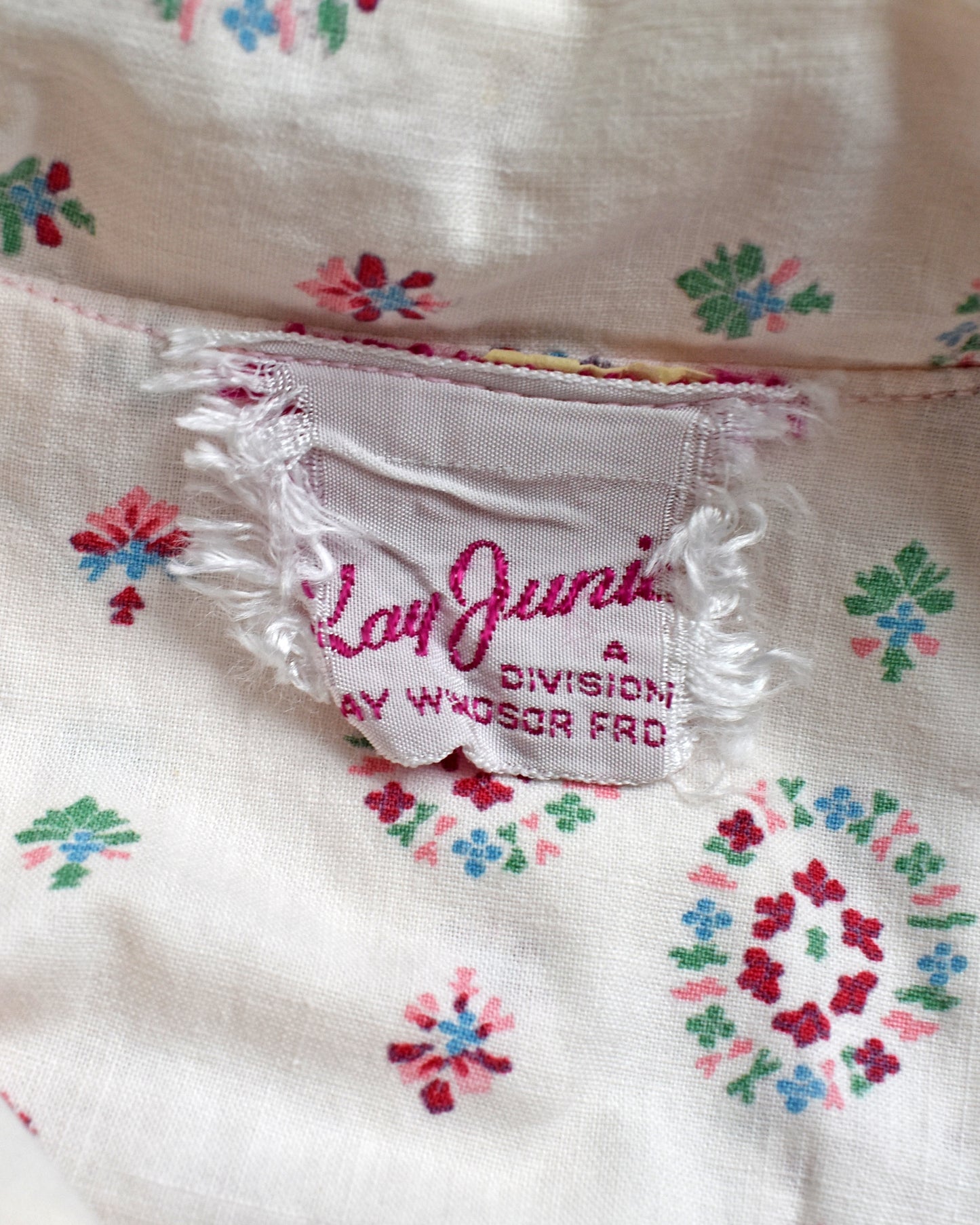 Close-up of a label that says Kay Juniors