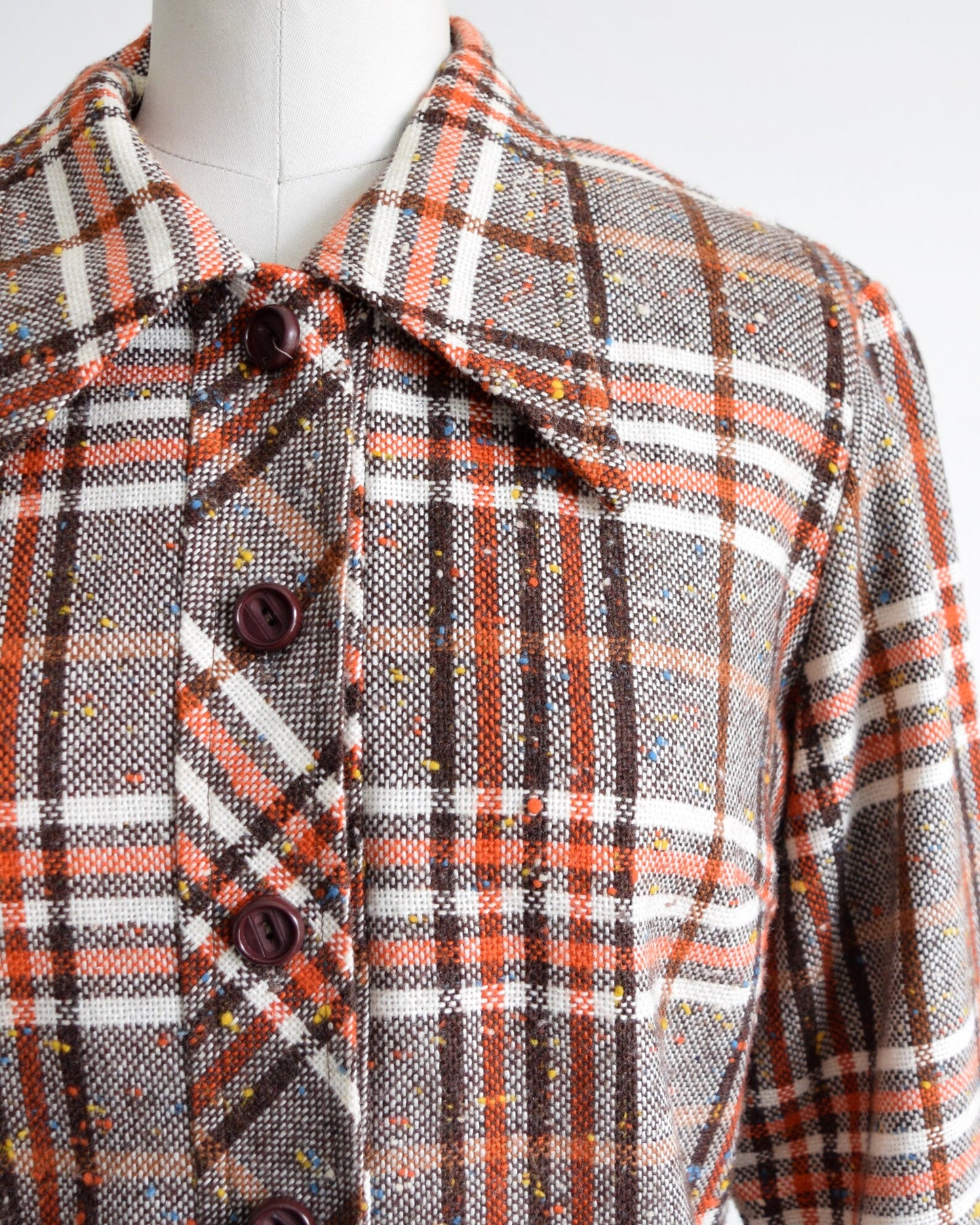 Close up of the flecked wool plaid