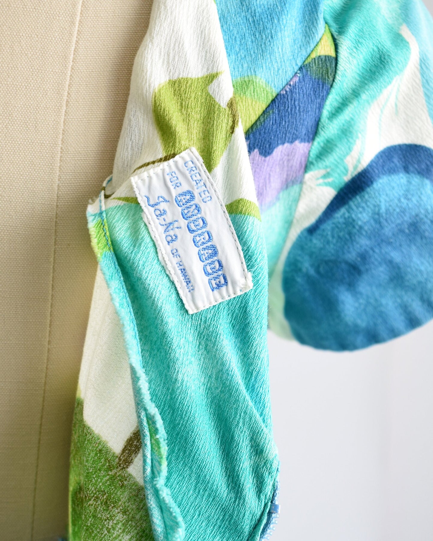 Close up of the tag which says Created for Andrade Ja-na of Hawaii