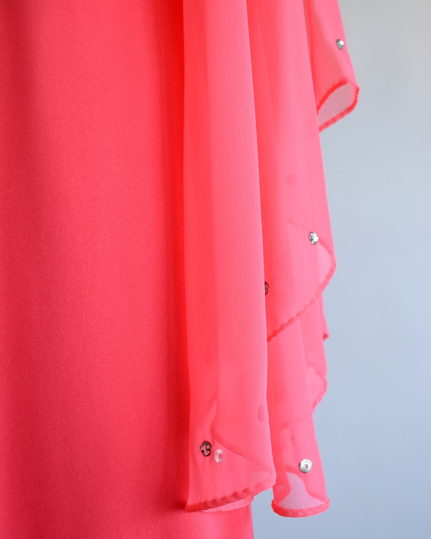 Close up of the rhinestones on the trim of the sleeves
