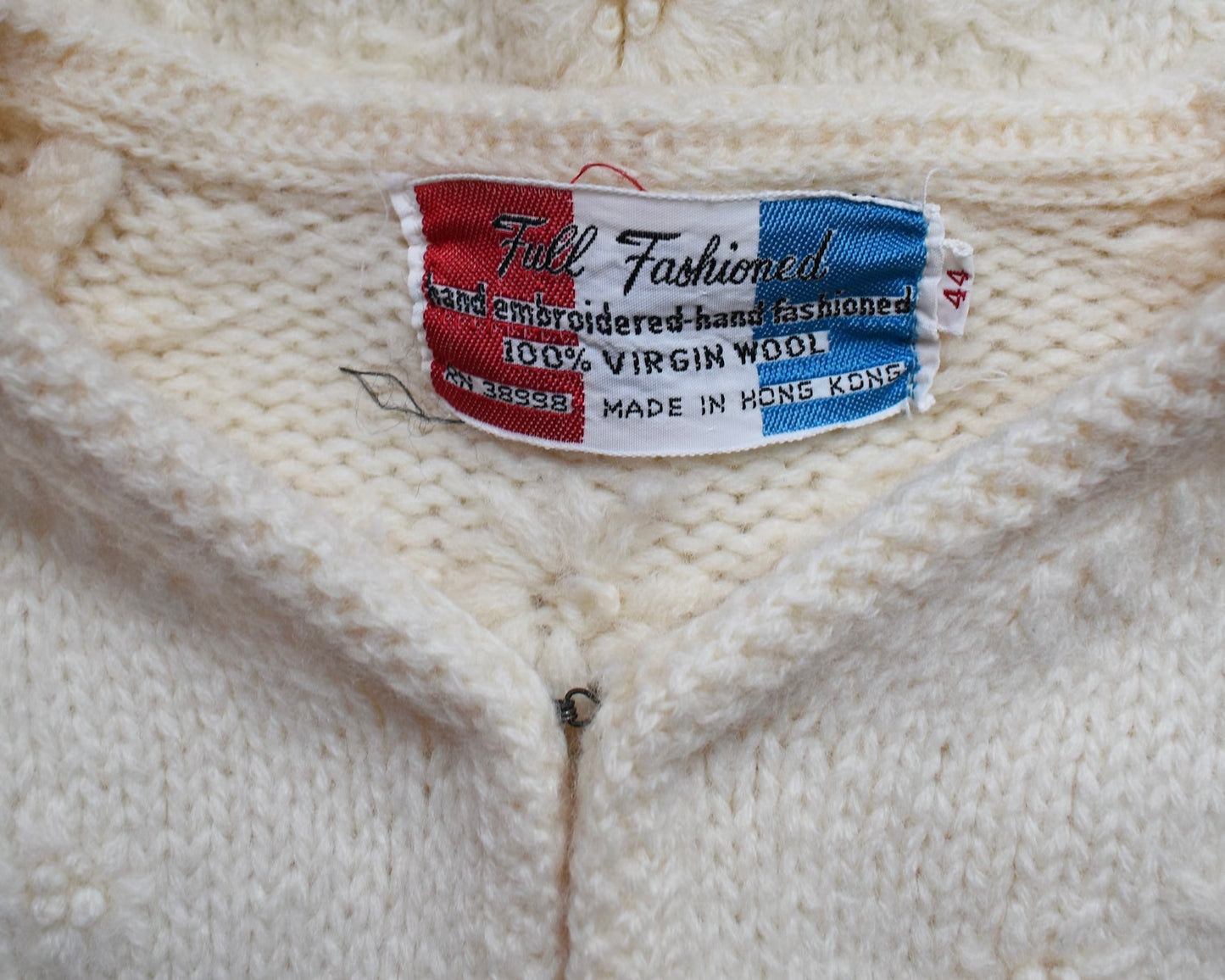 Close up of the tag that says Full Fashioned, 100% wool