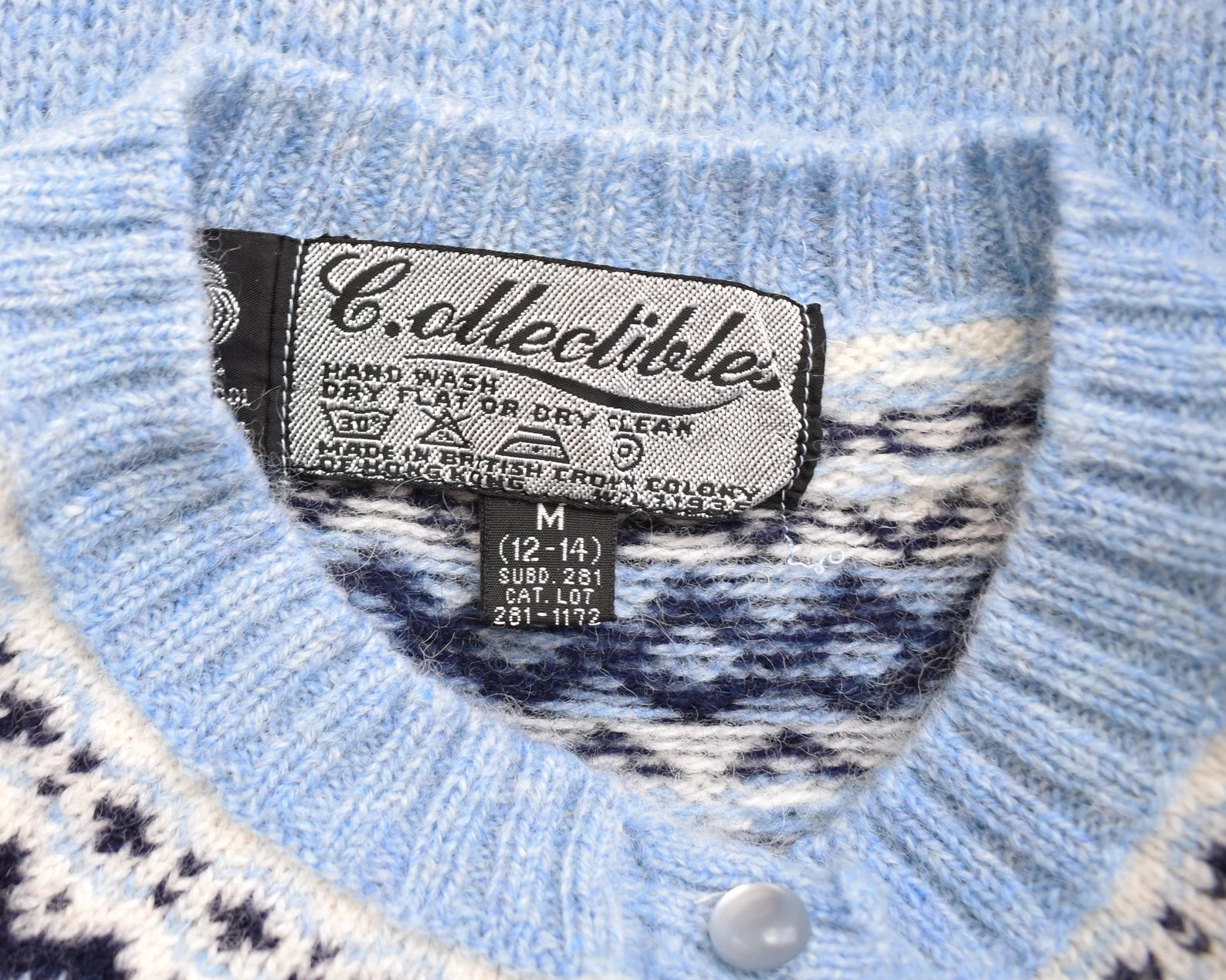 Close up of the tag which says C.ollectibles
