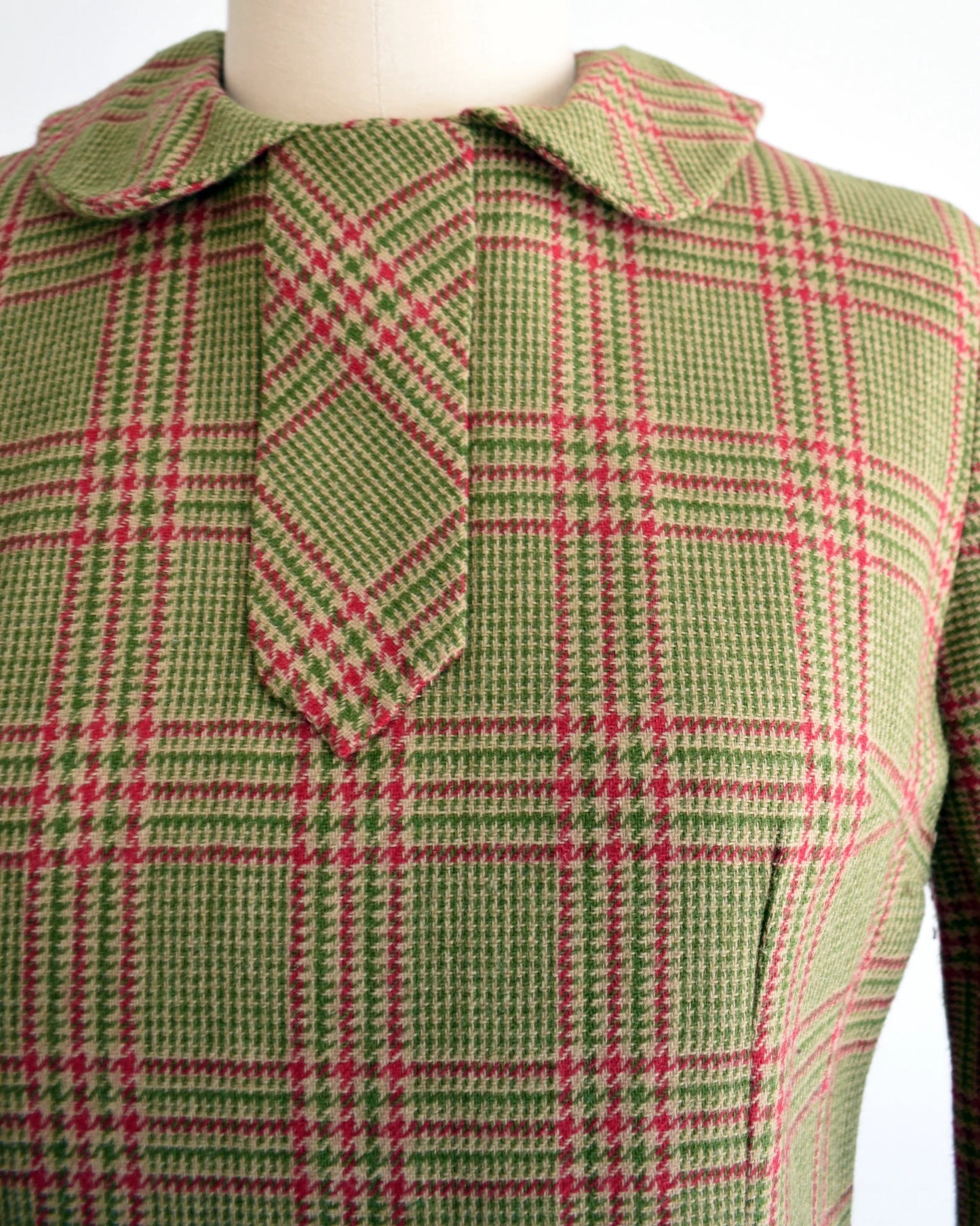 Close up of the green and pink plaid bodice