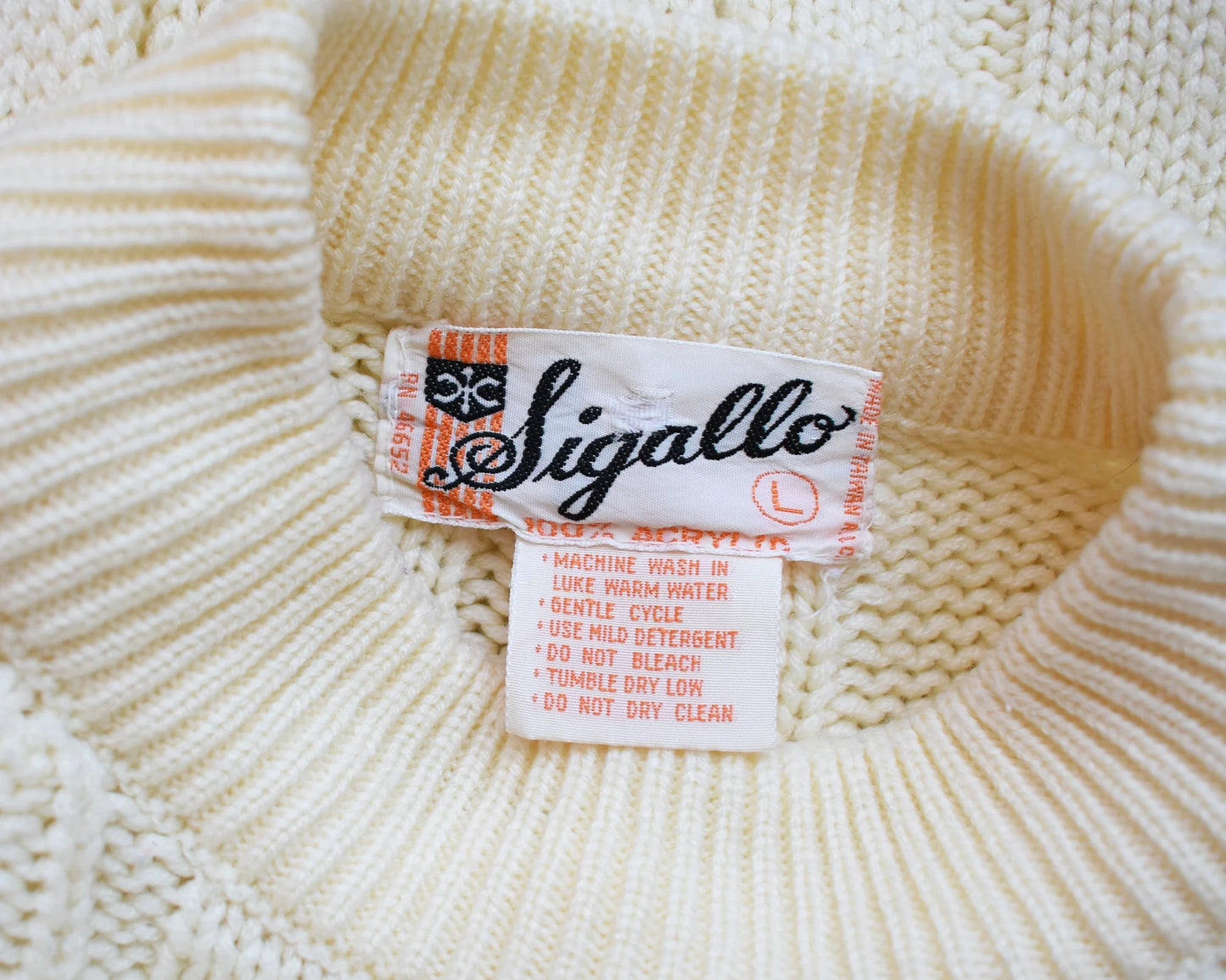 Close up of the tag that says Cobb Hill Sports Wear