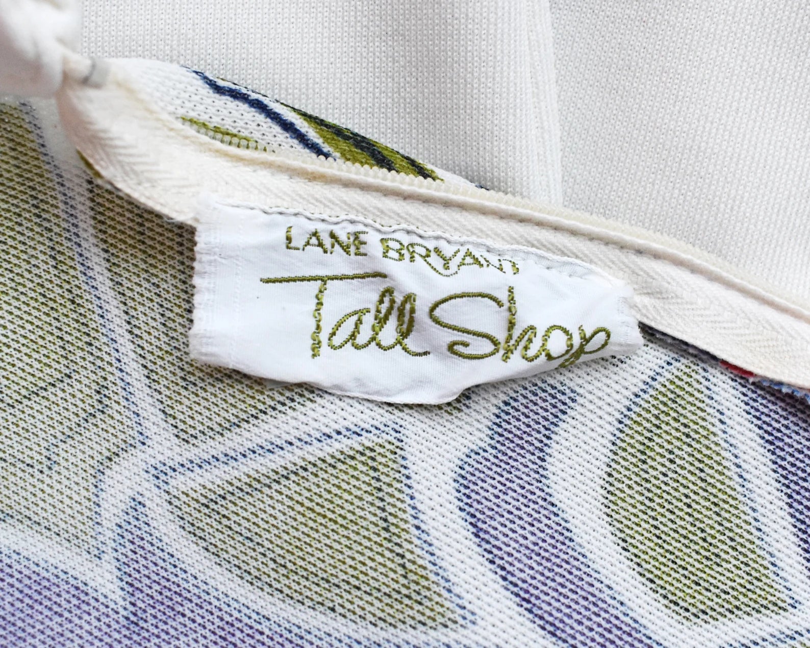 Close up of the tag which says Lane Bryant Tall Shop