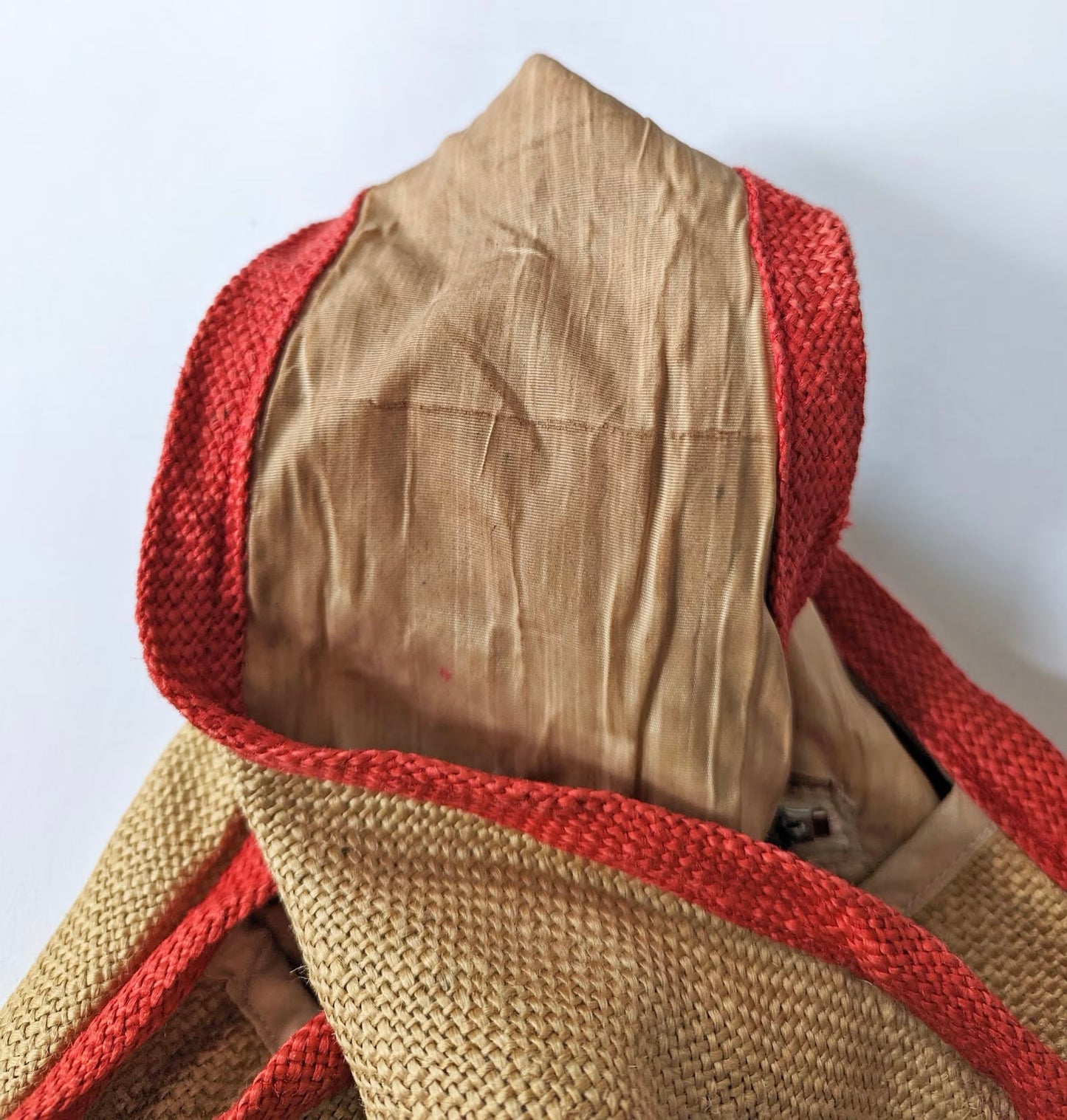 The handle is twisted over to show some marks on the lining