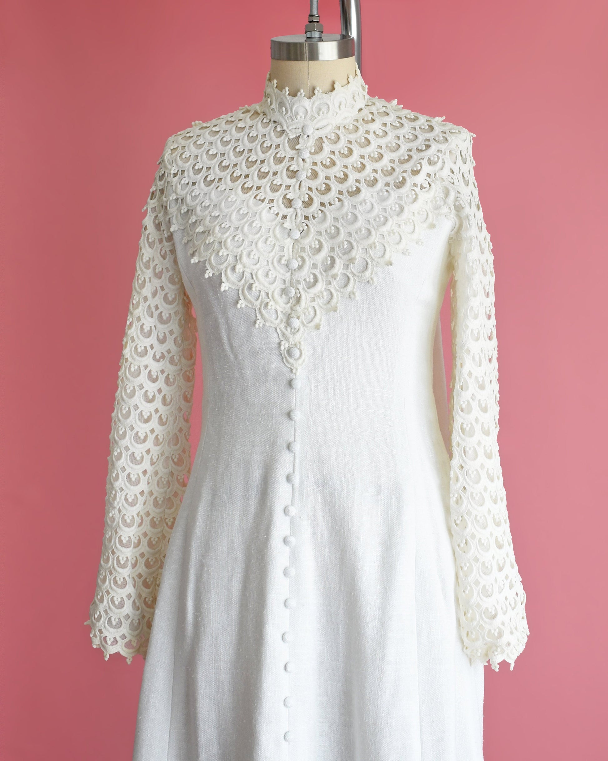 side view of vintage 60s linen wedding dress with crochet lace sleeves and crochet hem