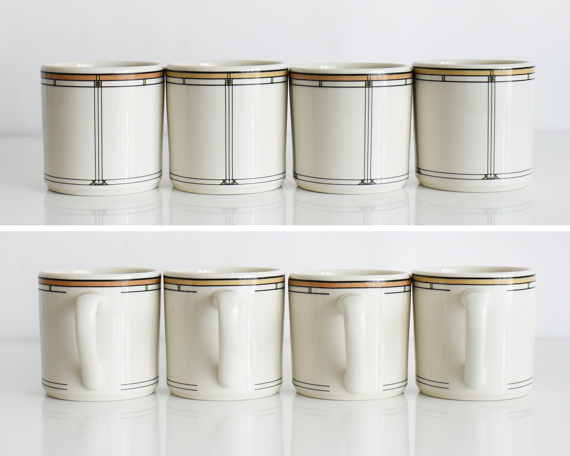 a split photo showing both sides of a set of four vintage Frank Lloyd Wright Martin House white mugs with gold trim on a white background