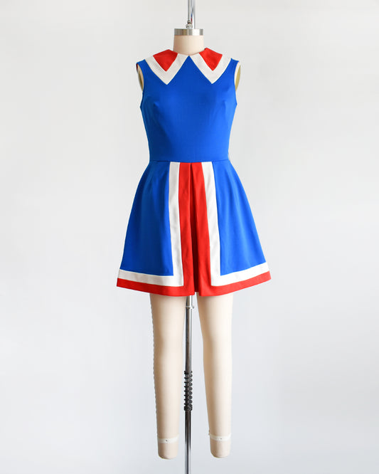 a vintage 60s/70s blue and red mod mini dress on a mannequin against a white background