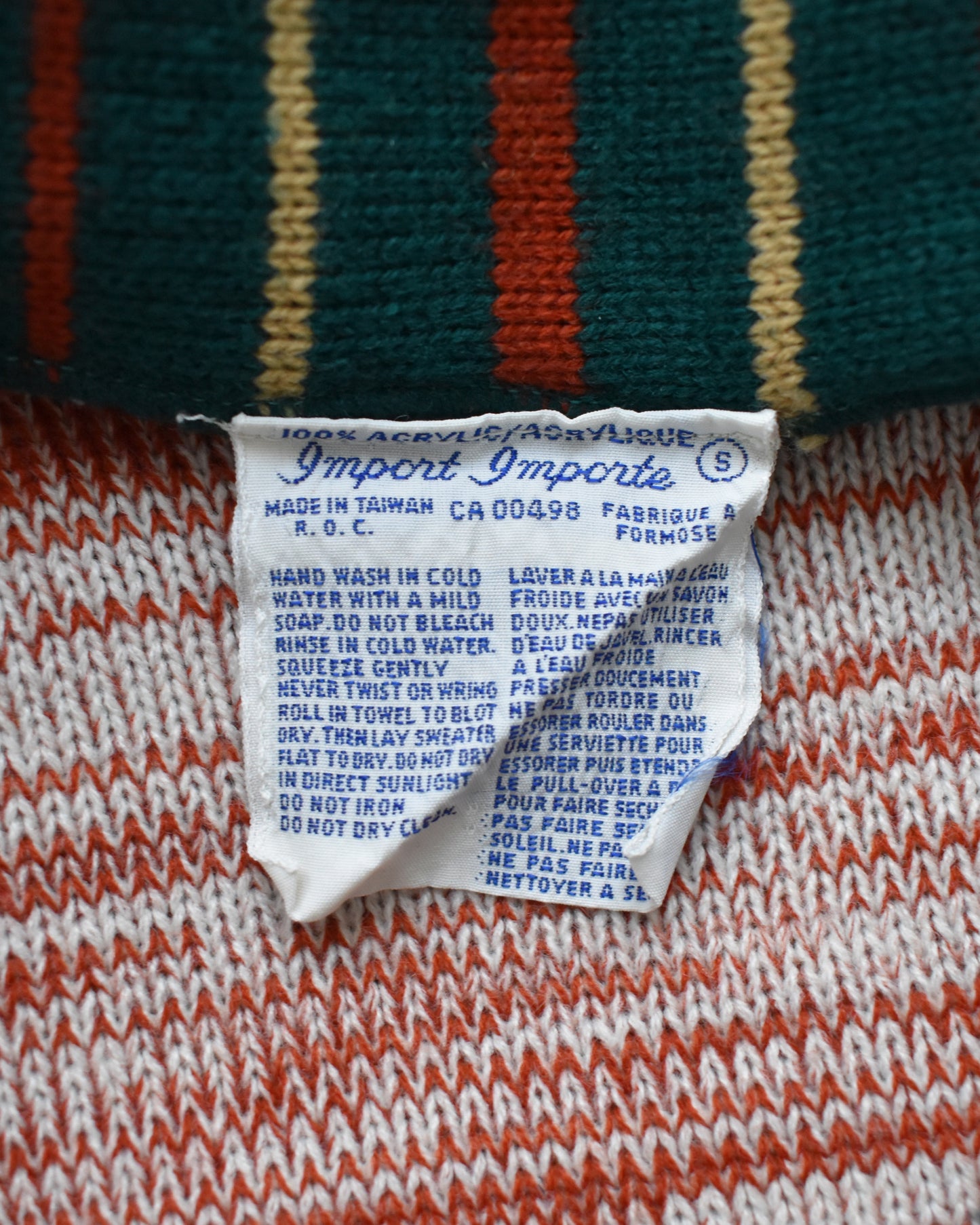 close up of the tag which says Import and care instructions