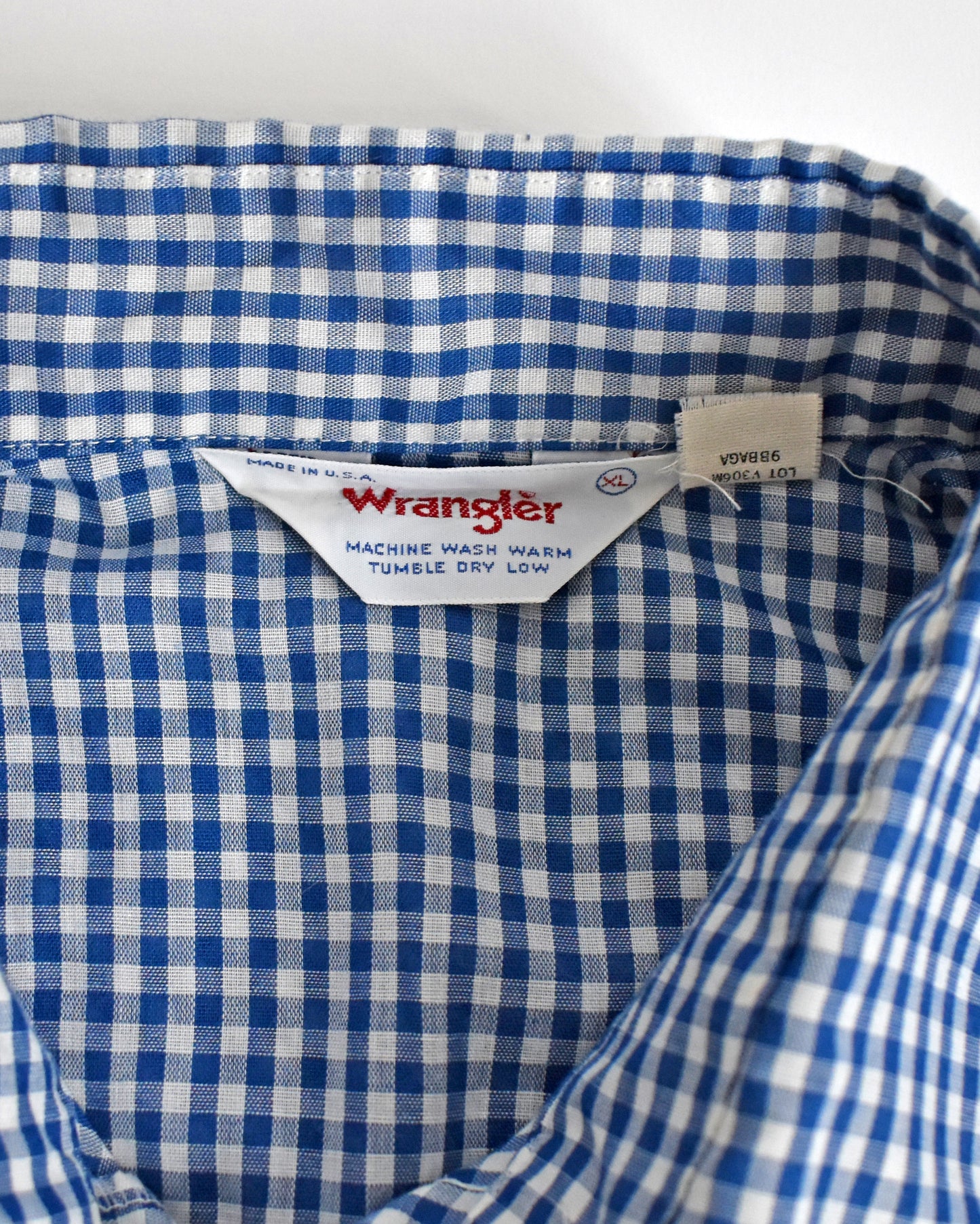 Close-up of the Wrangler label on the shirt