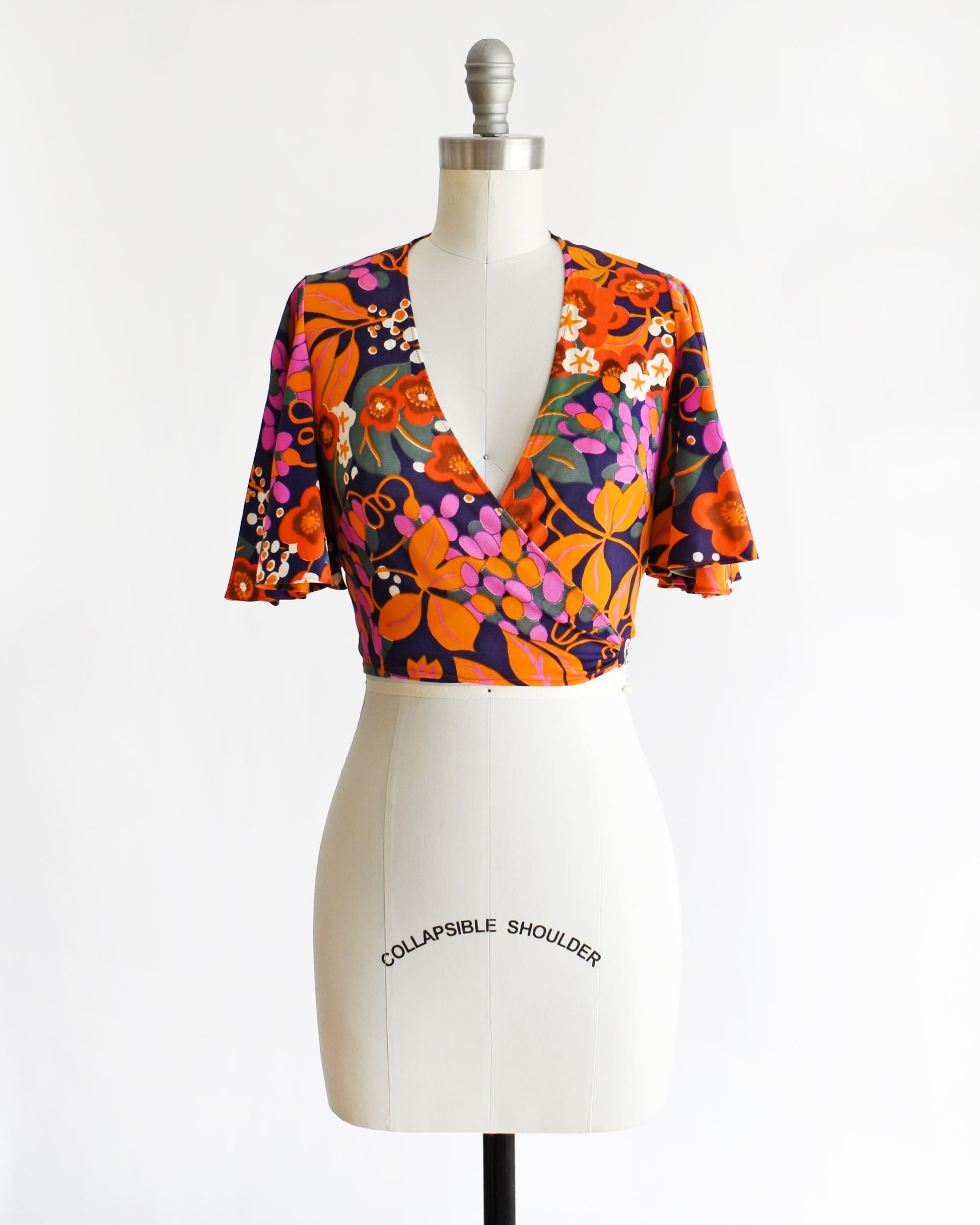 a vintage 70s floral wrap blouse