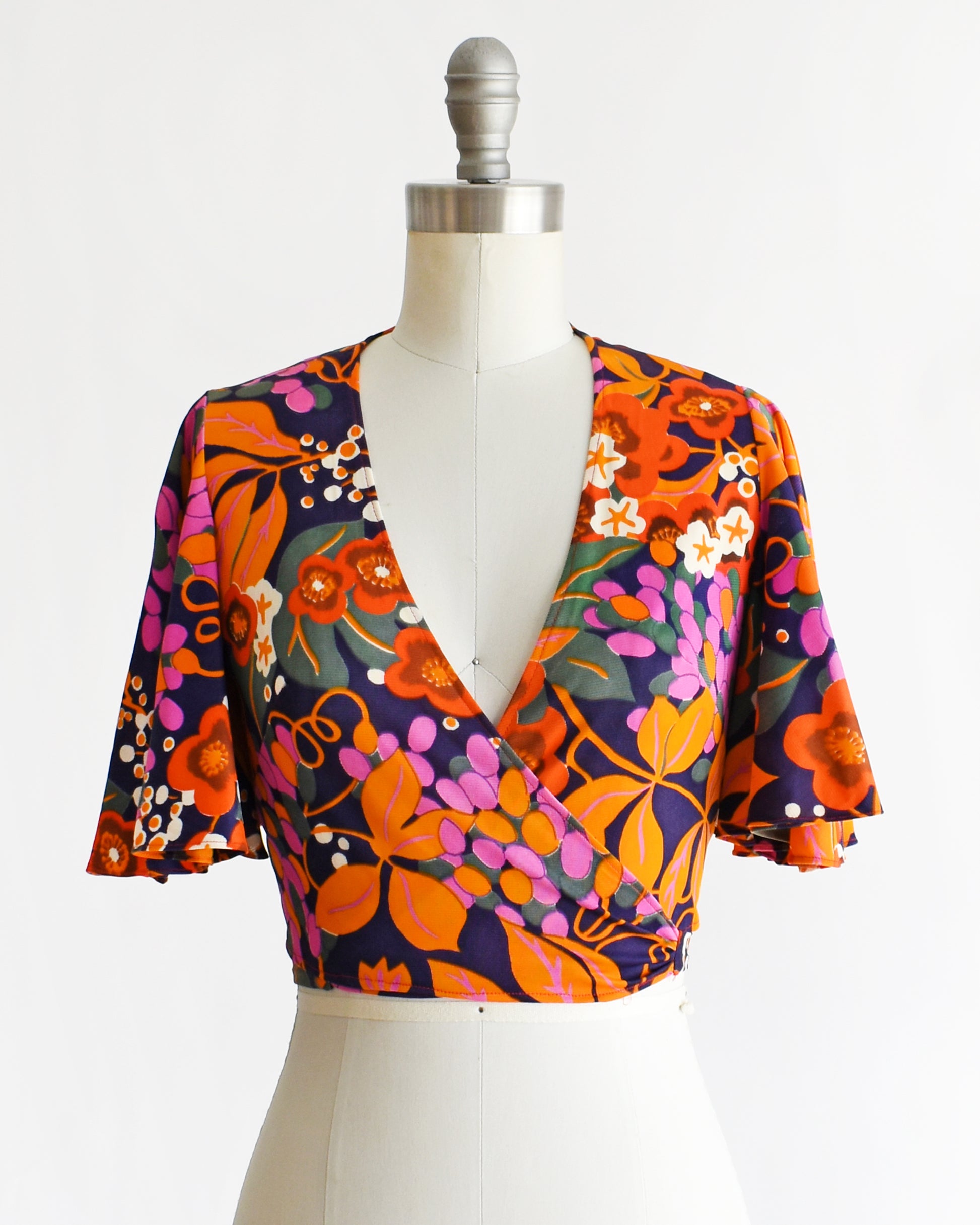 a vintage 70s floral wrap blouse