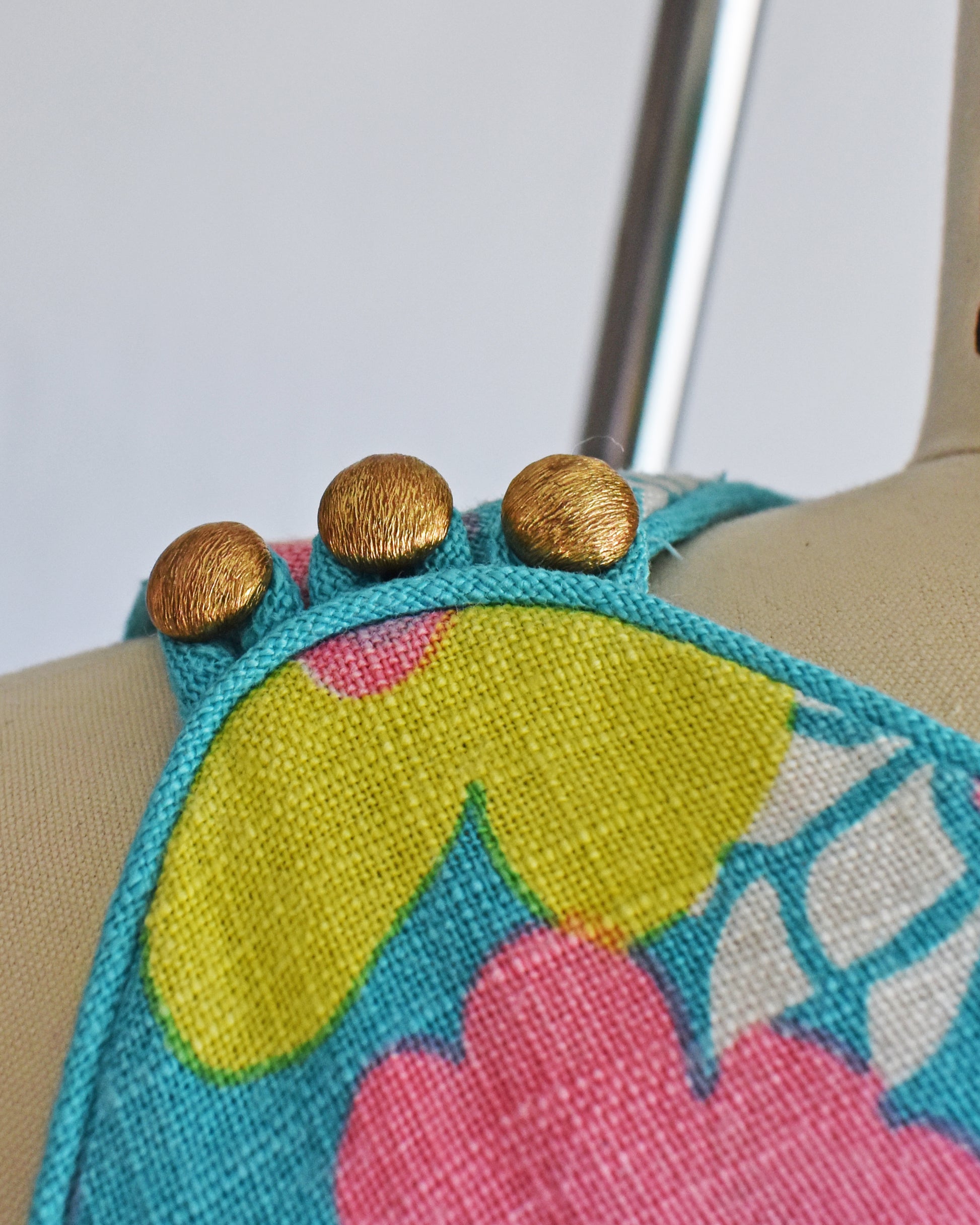 Close up of the buttons that are on the shoulders