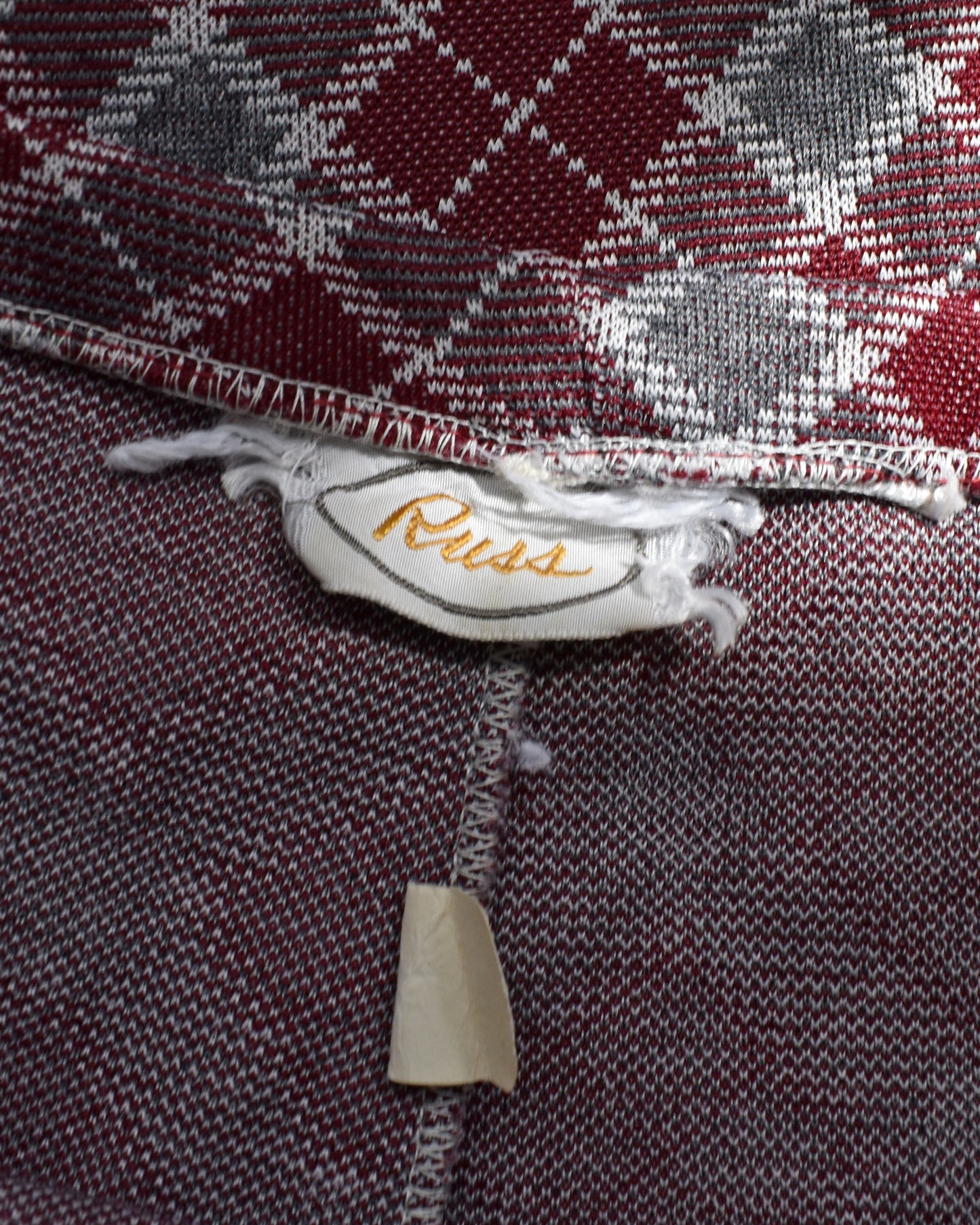 close up of the tag which says Russ