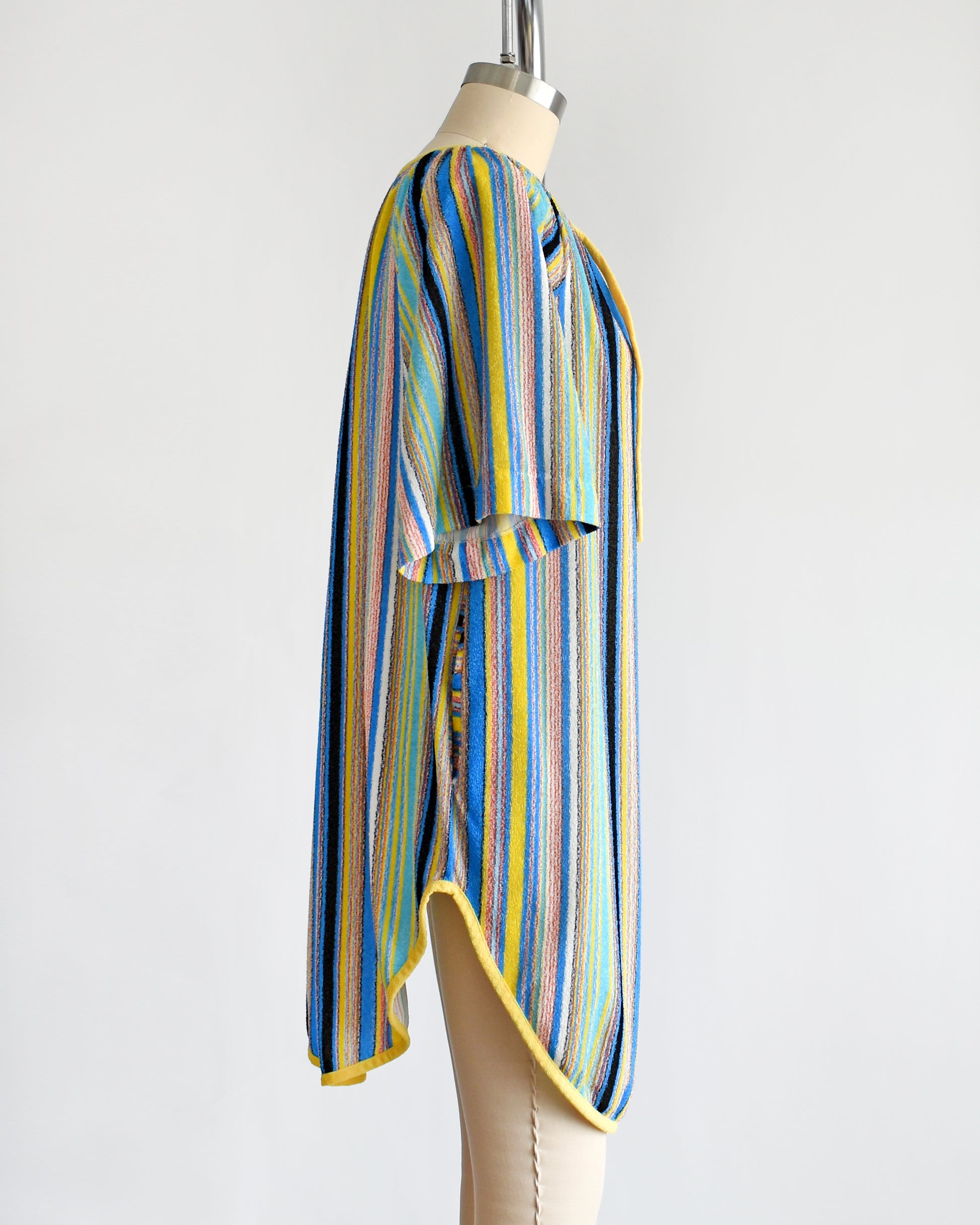 side view of a vintage 1970s striped terry cloth cover-up dress