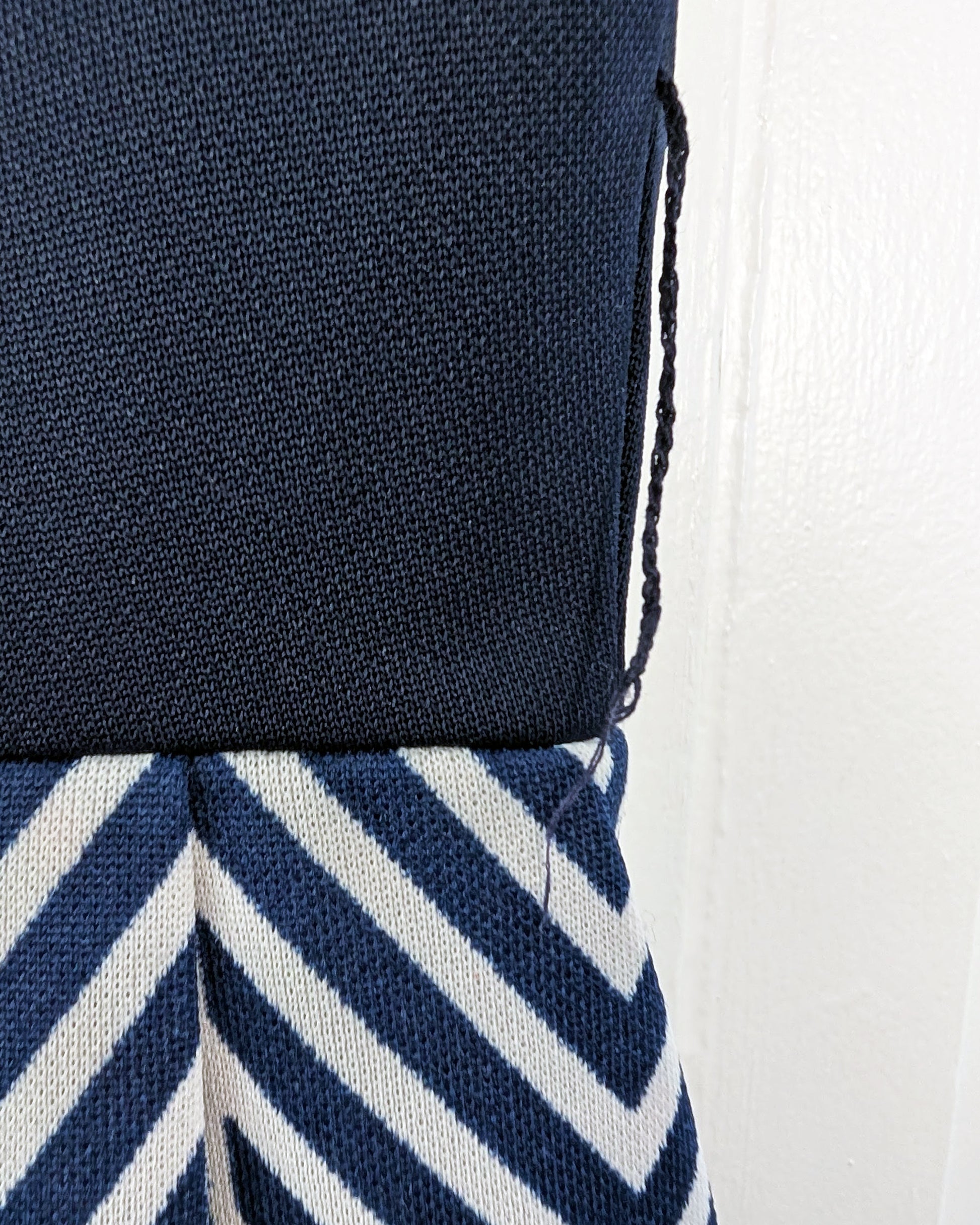 close up of the left side belt loop that has become detached