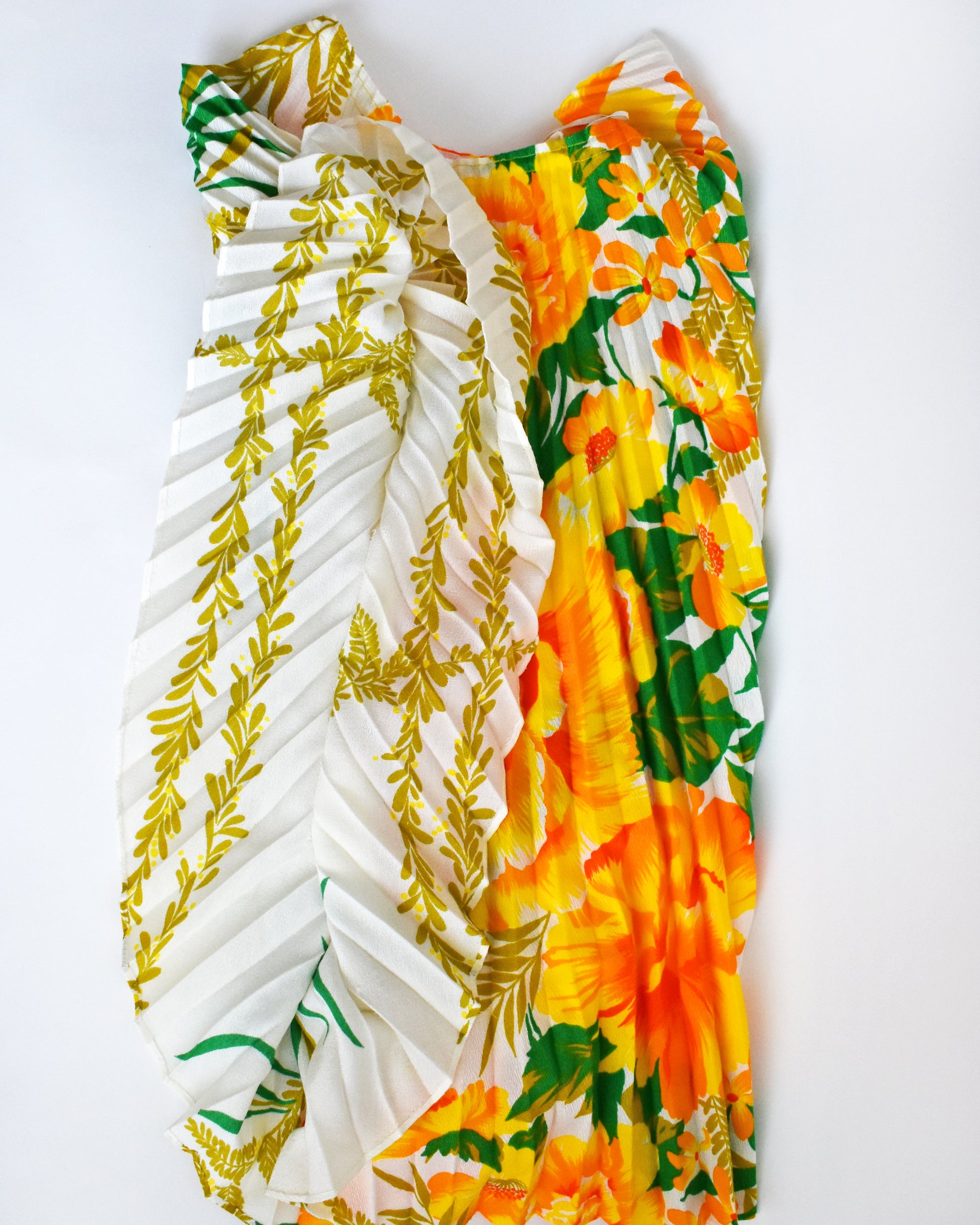 a flat lay of the caftan blouse showing the arm seams