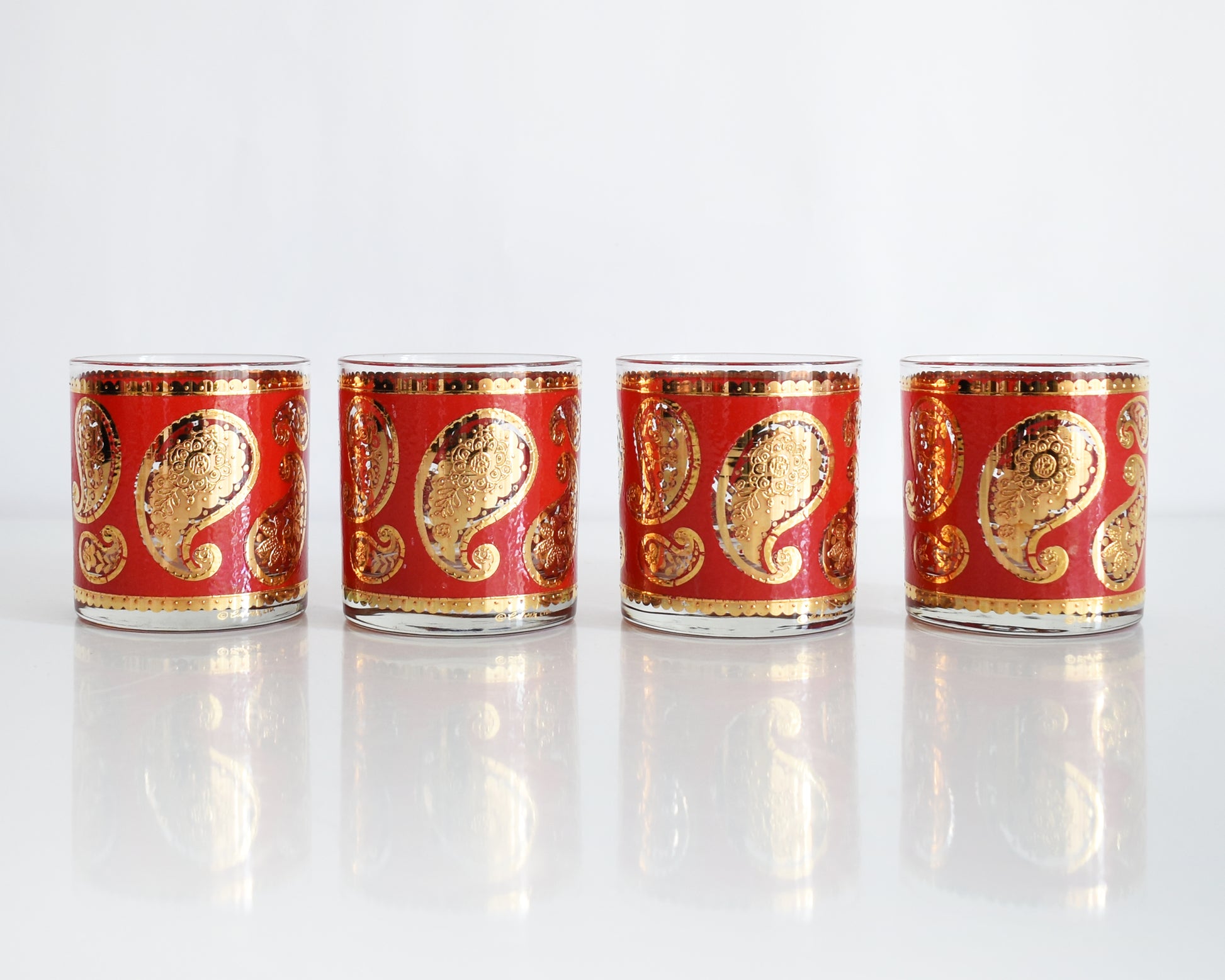 Vintage 1960s Red & Gold Paisley Glasses by Culver on a white background