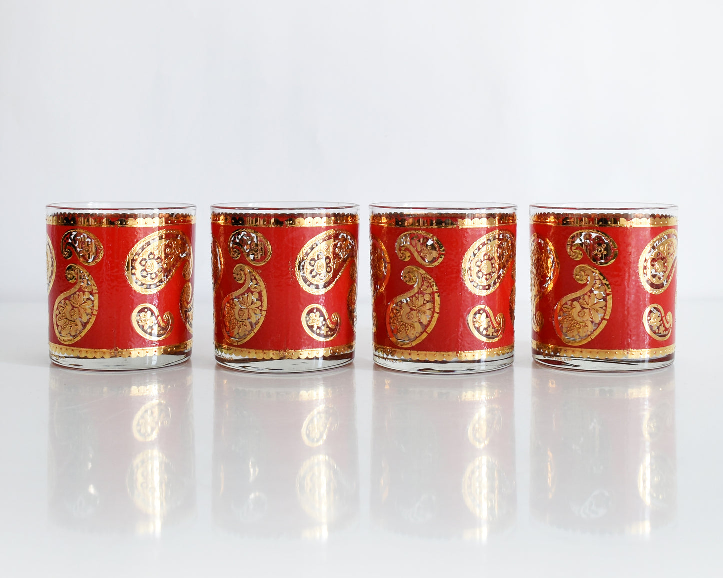 Vintage 1960s Red & Gold Paisley Glasses by Culver on a white background