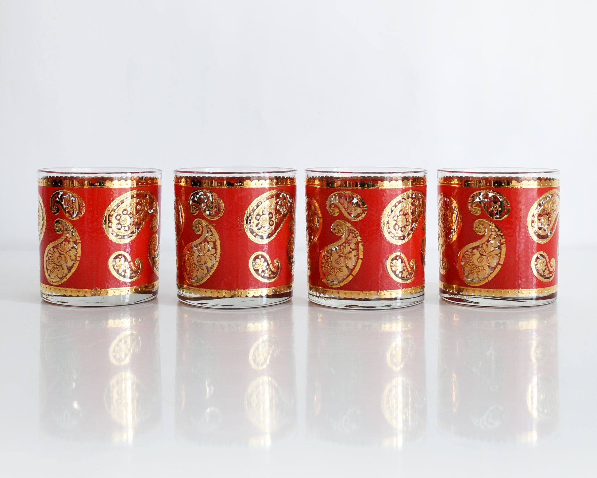 Vintage 1960s Red & Gold Paisley Glasses by Culver on a white background