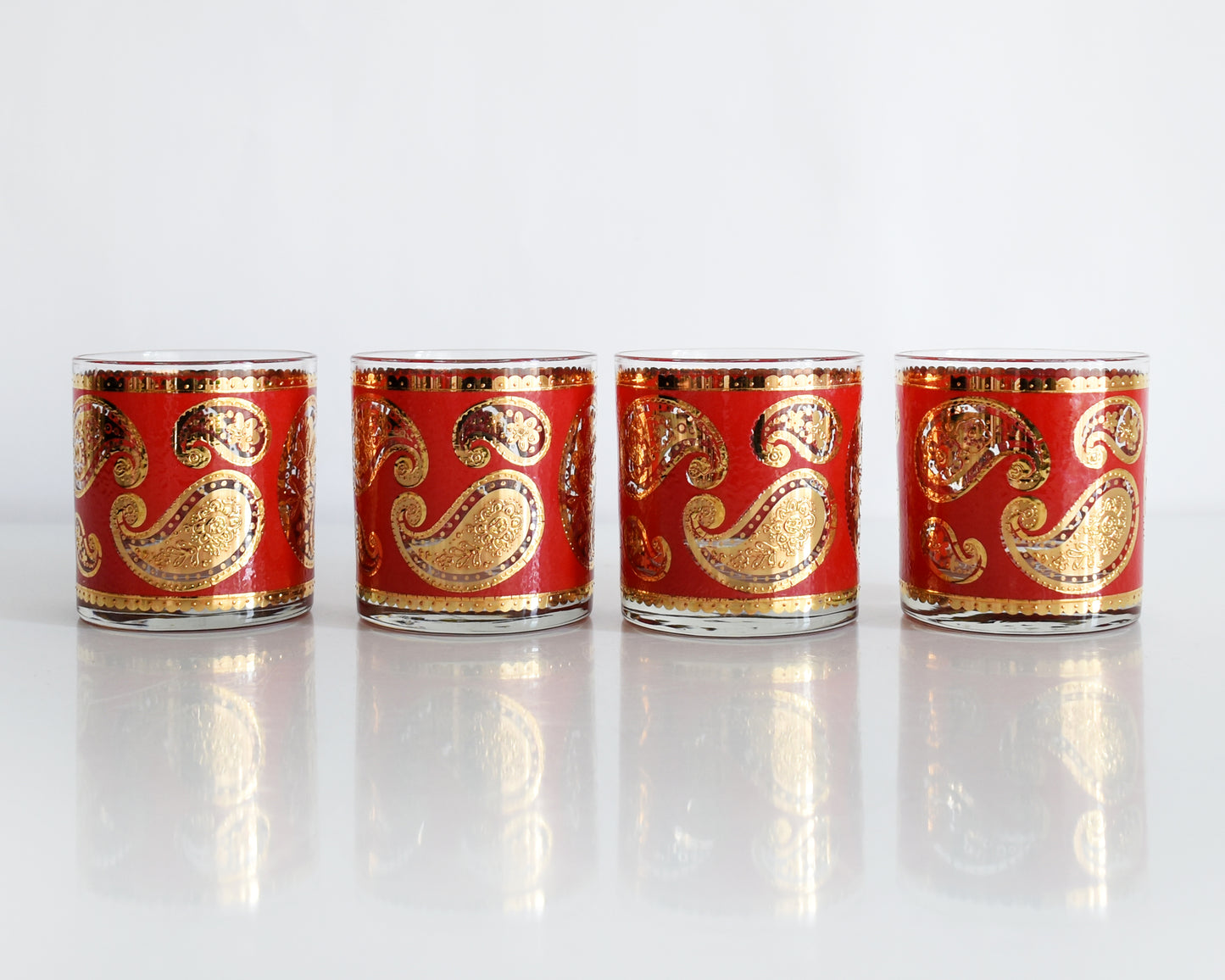 Vintage 1960s Red & Gold Paisley Glasses by Culver on a white background