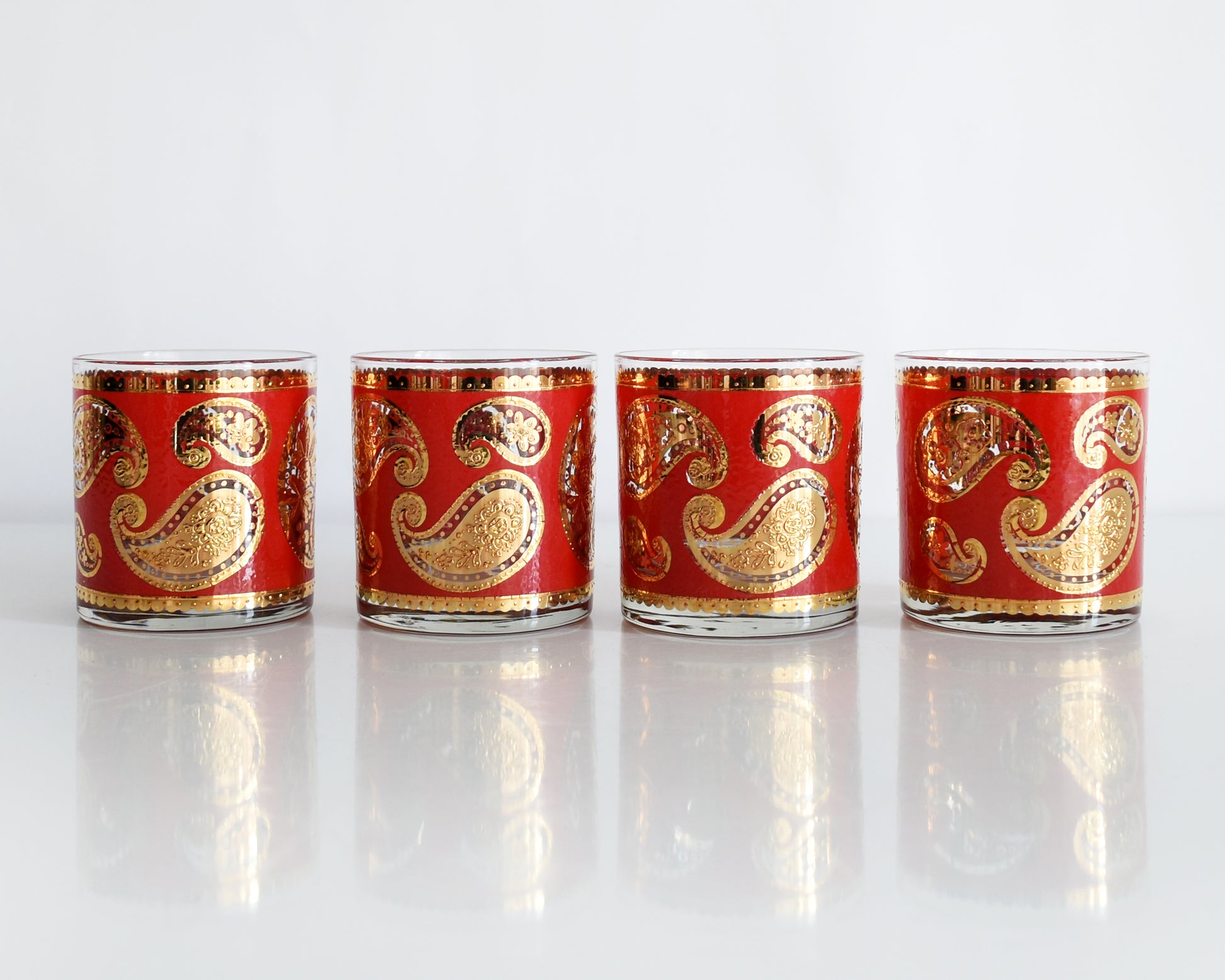 Vintage 1960s Red & Gold Paisley Glasses by Culver on a white background