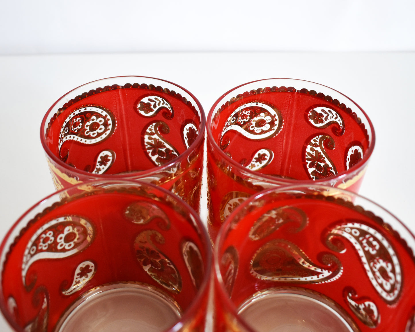 Vintage 1960s Red & Gold Paisley Glasses by Culver on a white background
