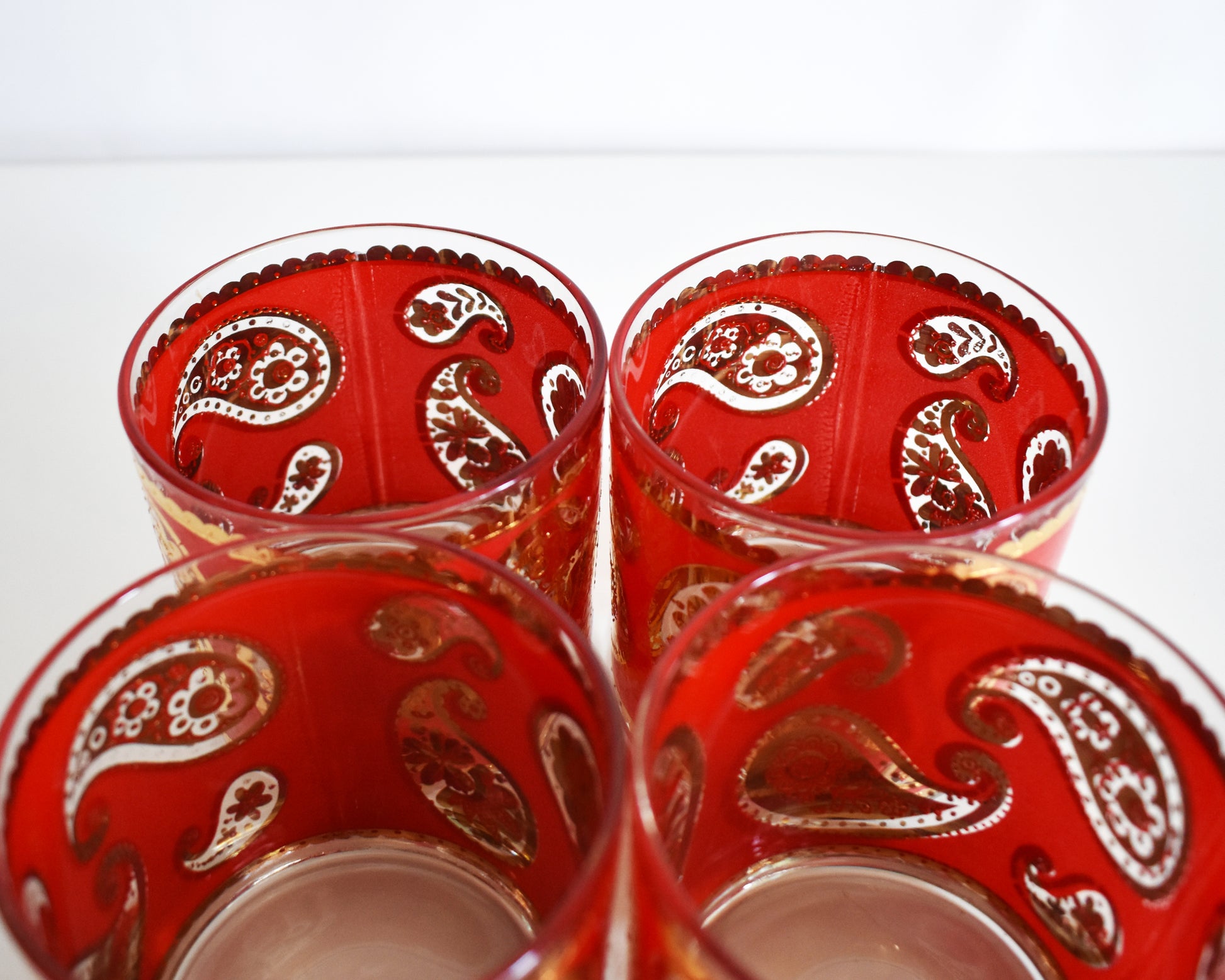 Vintage 1960s Red & Gold Paisley Glasses by Culver on a white background