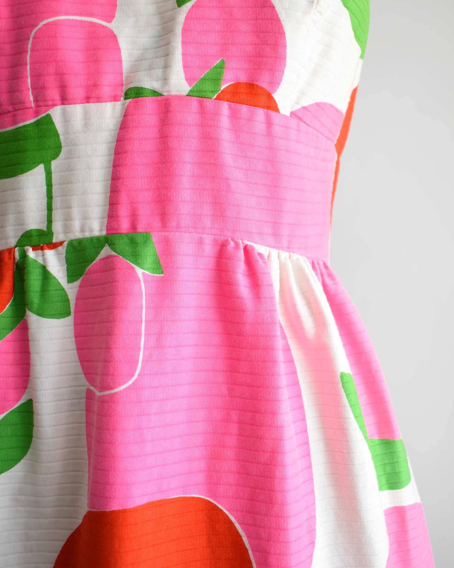 close up of the bodice of the maxi dress showing the fabric texture and print