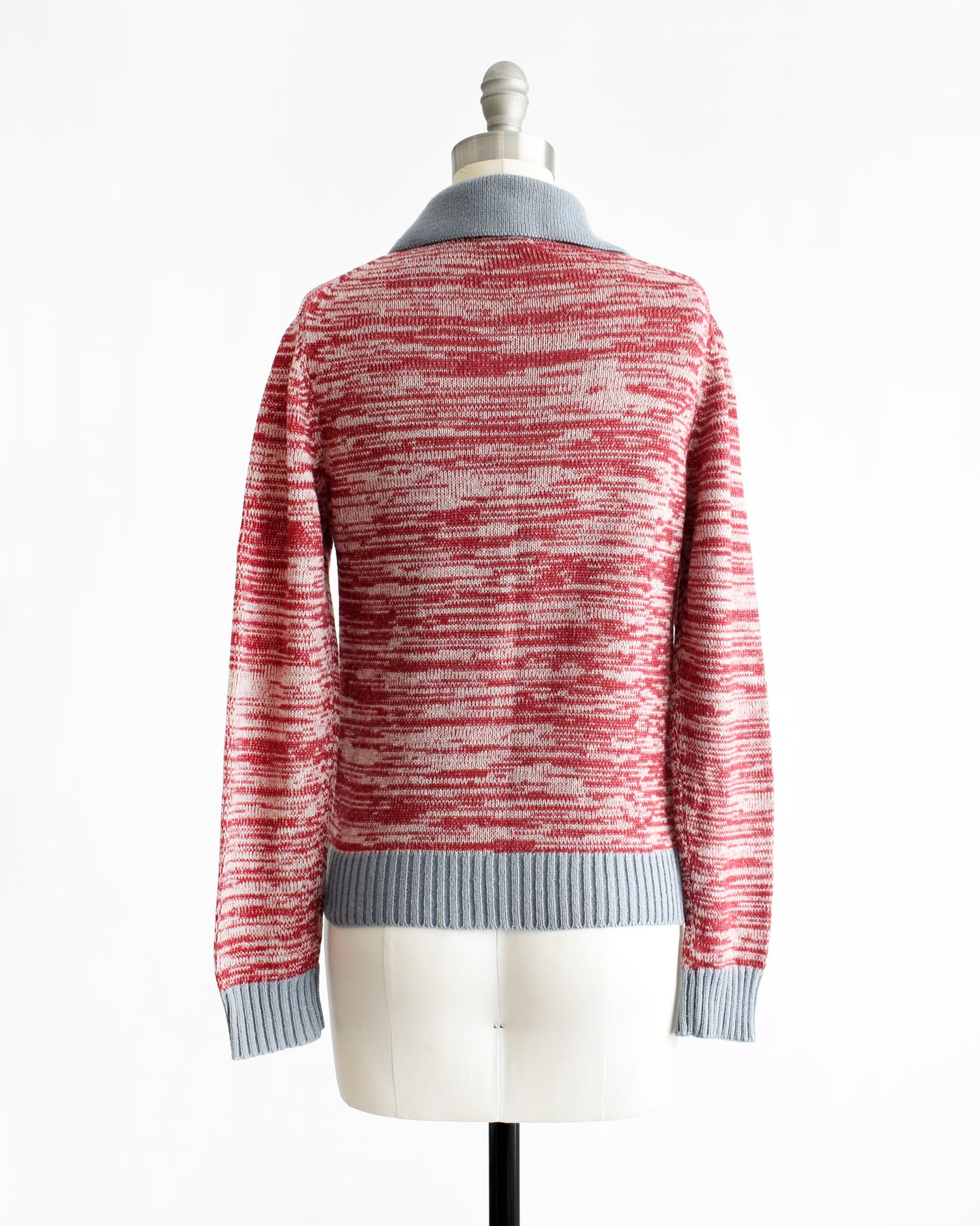 back view of a vintage 1970s red space dye sweater with fishing boating design on a mannequin against a white background