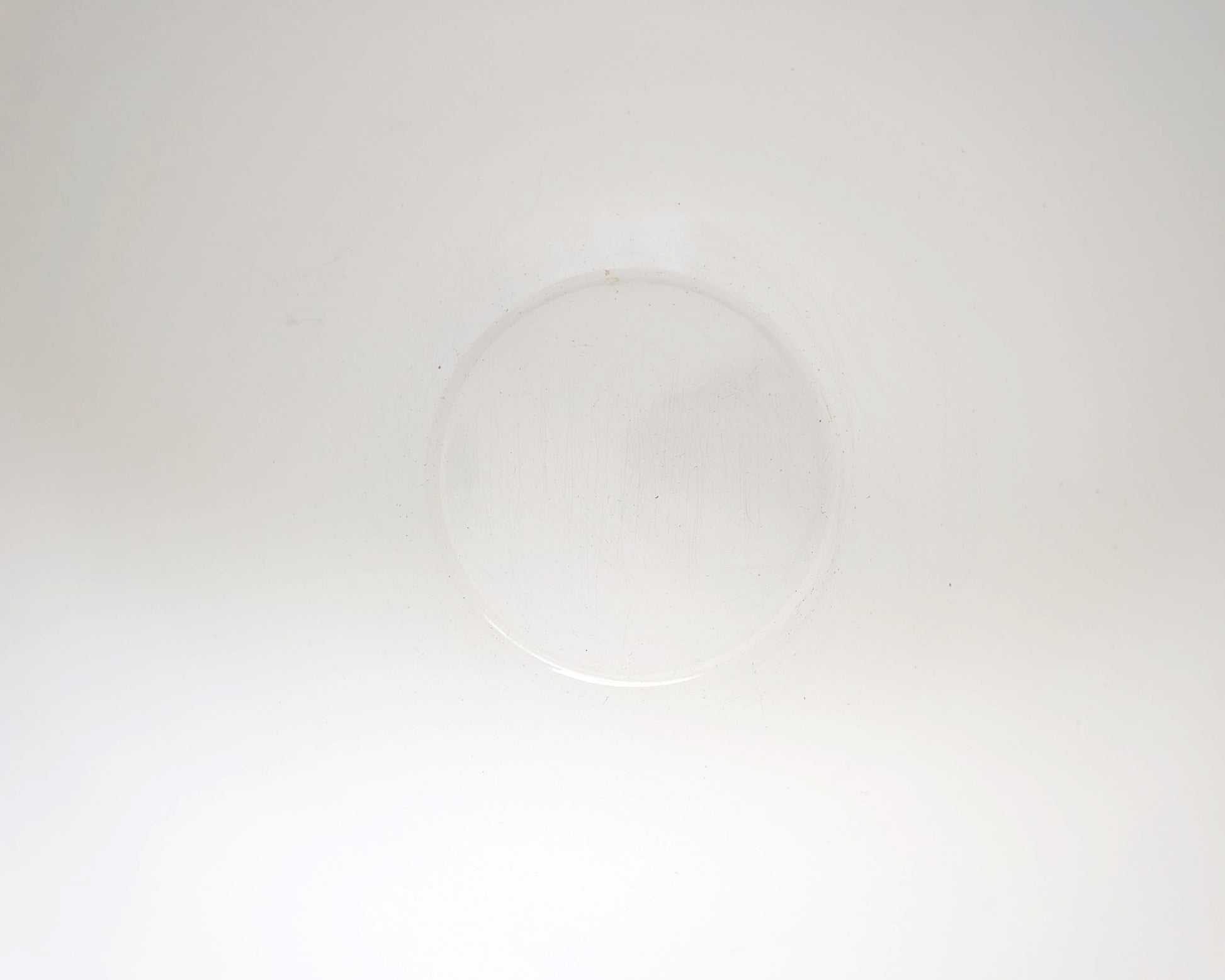 overhead shot of inside a vintage white 1970s Finel Arabia Finland bowl