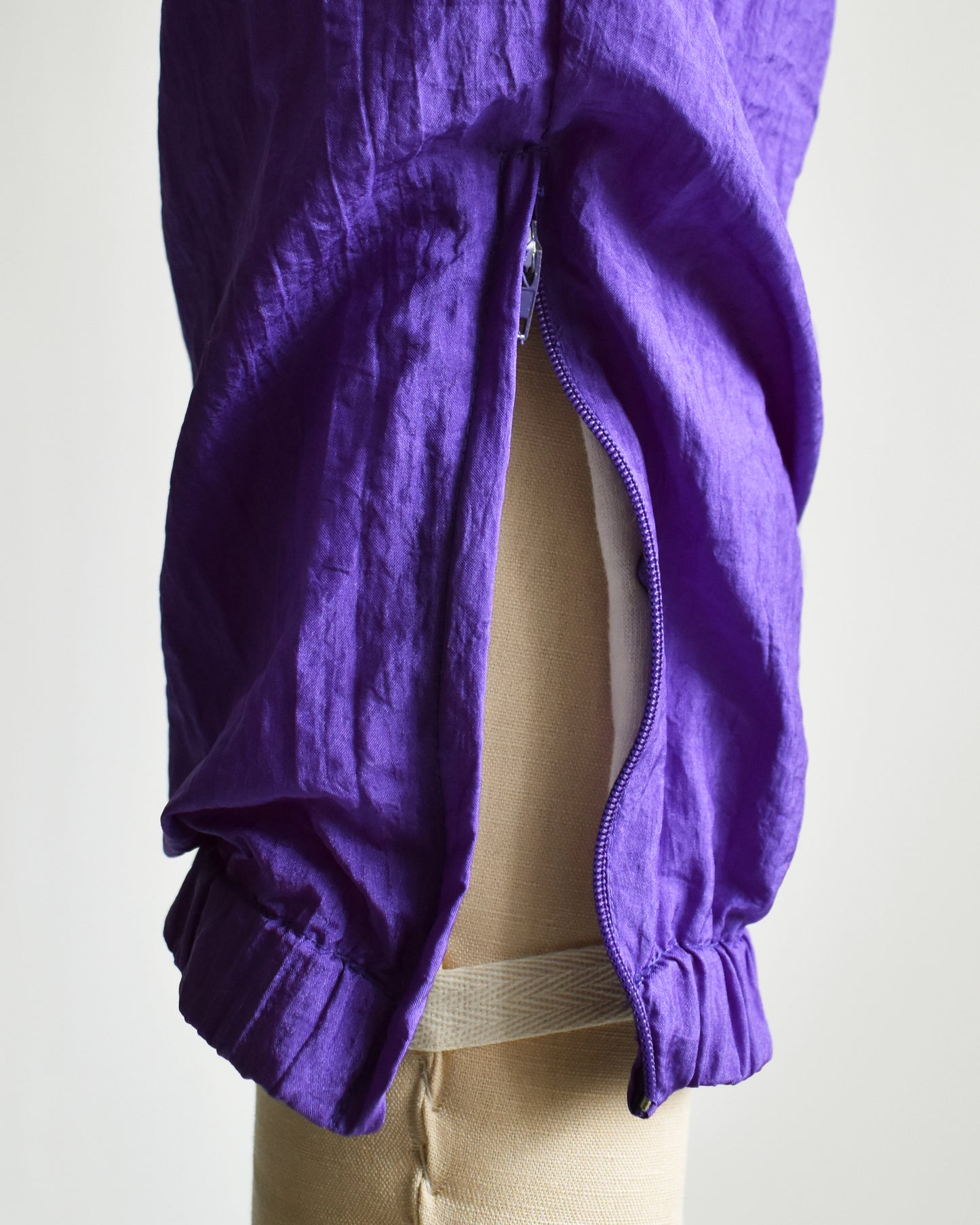 close up of the zipper on the pants