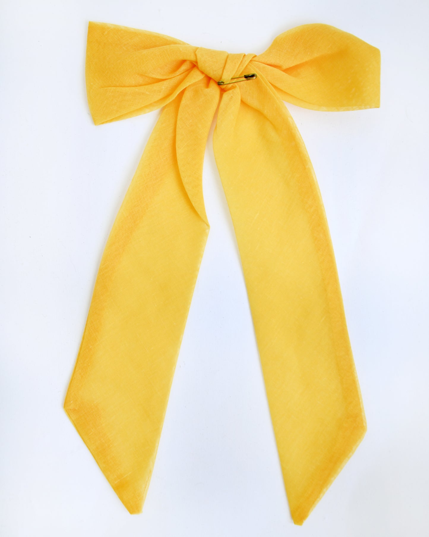 close up of the back of the bow that shows the safety pin