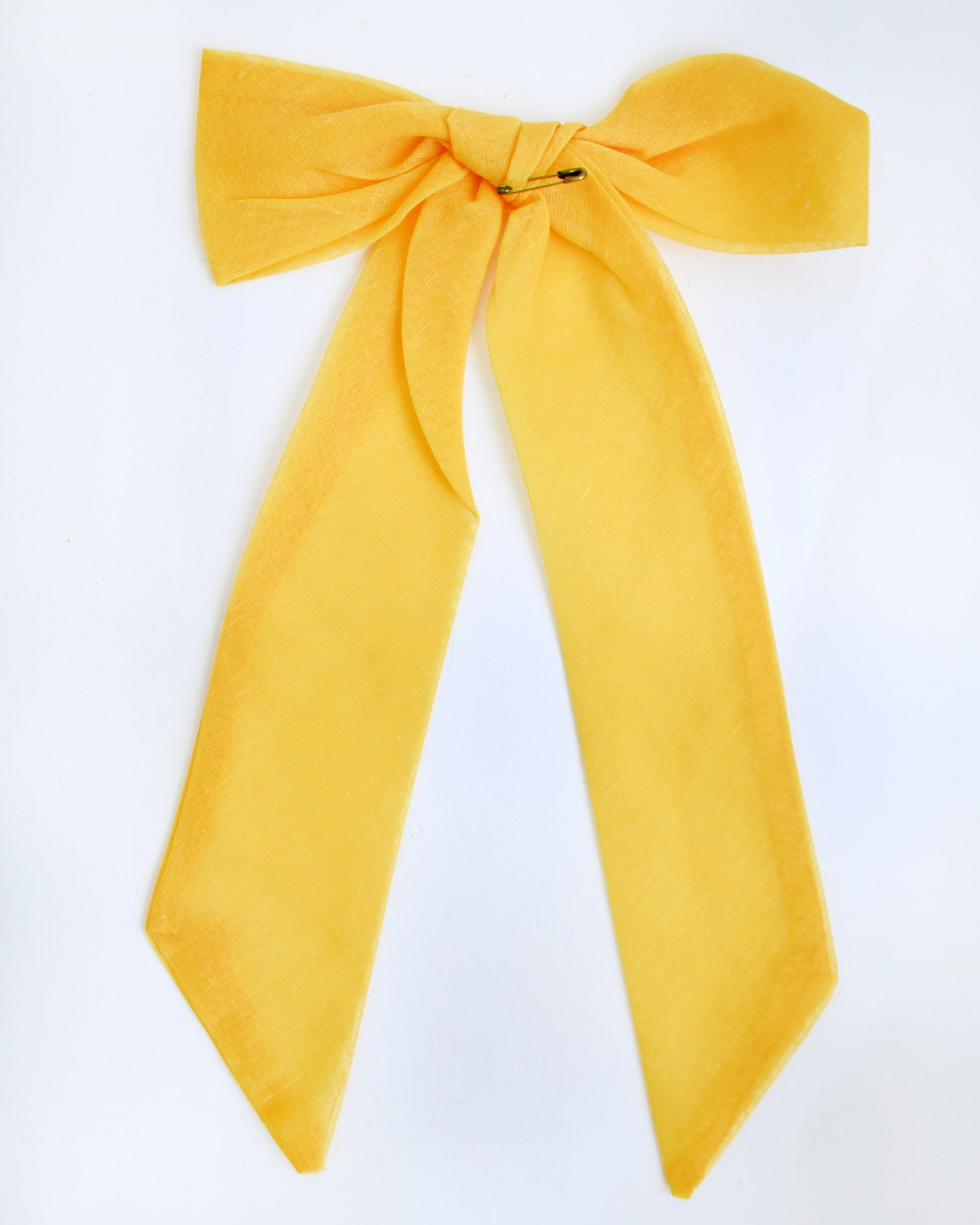 close up of the back of the bow that shows the safety pin